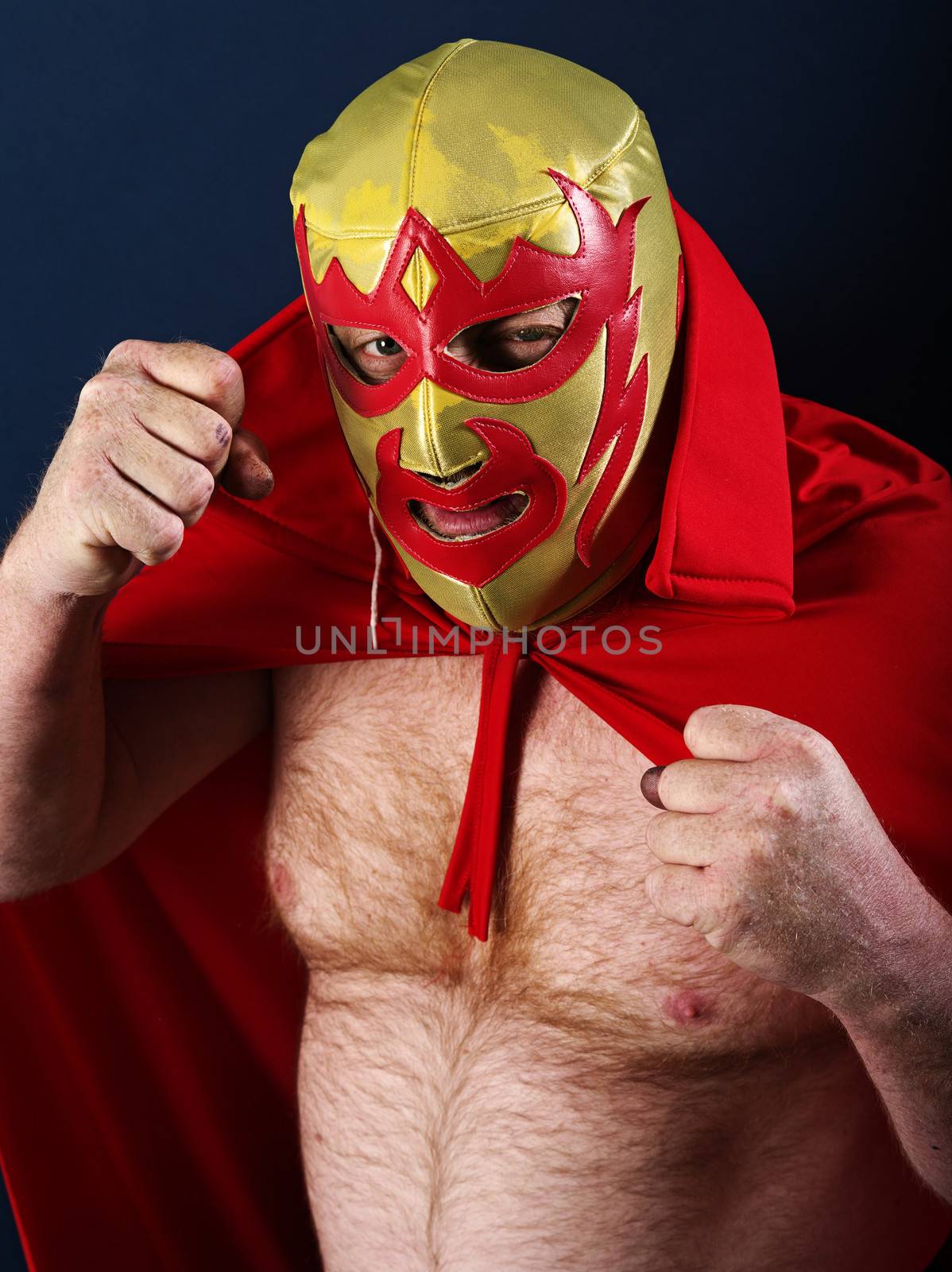 Photograph of a Mexican wrestler or Luchador posing.
