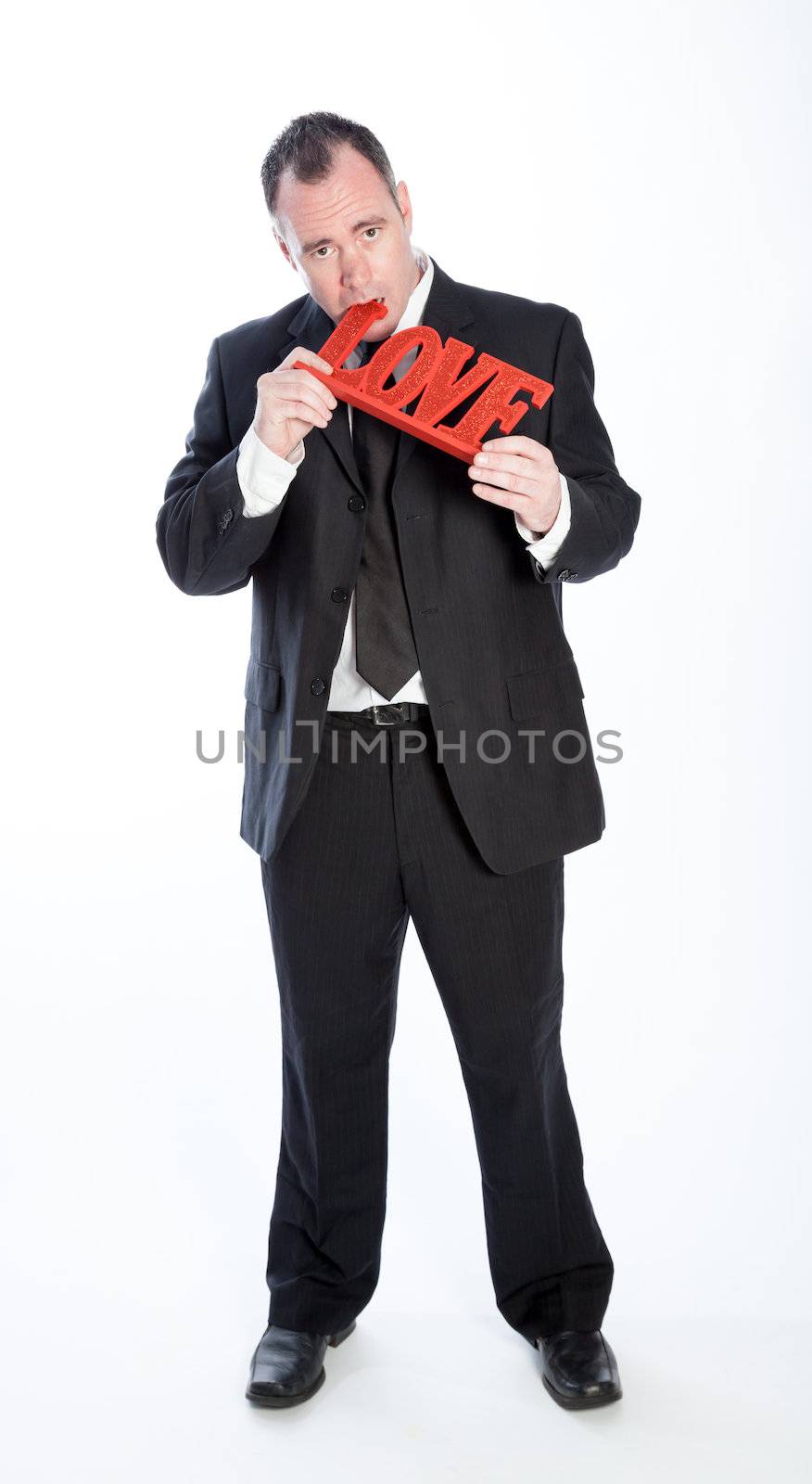 Romantic people in love shot in studio isolated on a white background