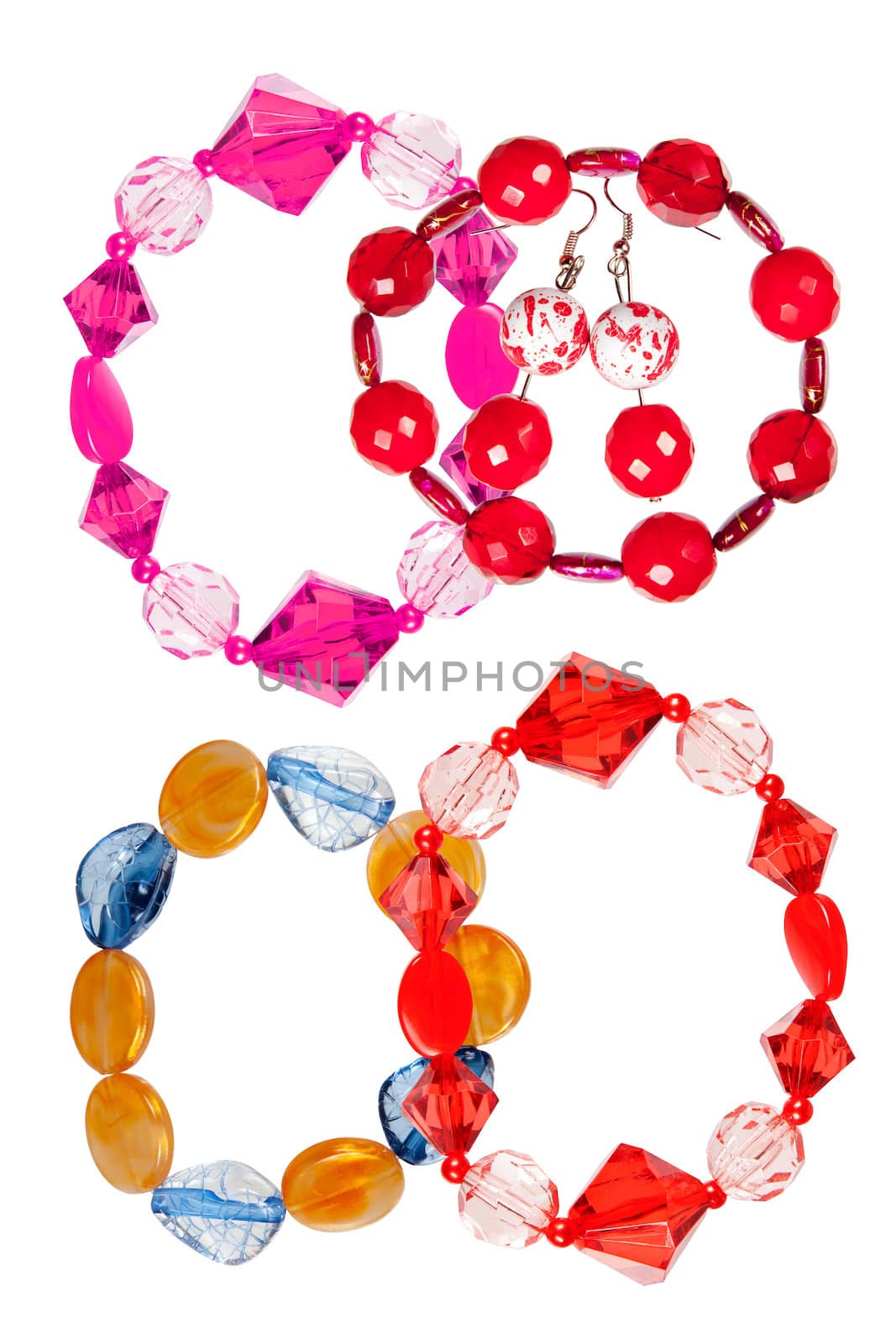 A set of handmade bracelets made of glass, isolated on a white background. Collage