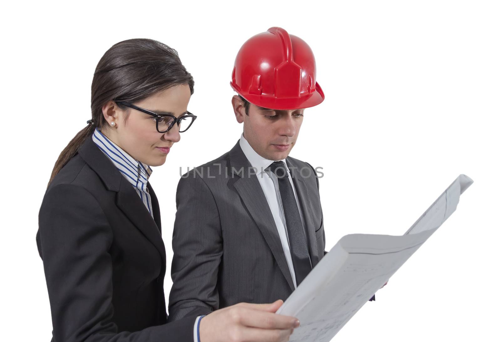 Couple of architects revising a house project plans, isolated on white background