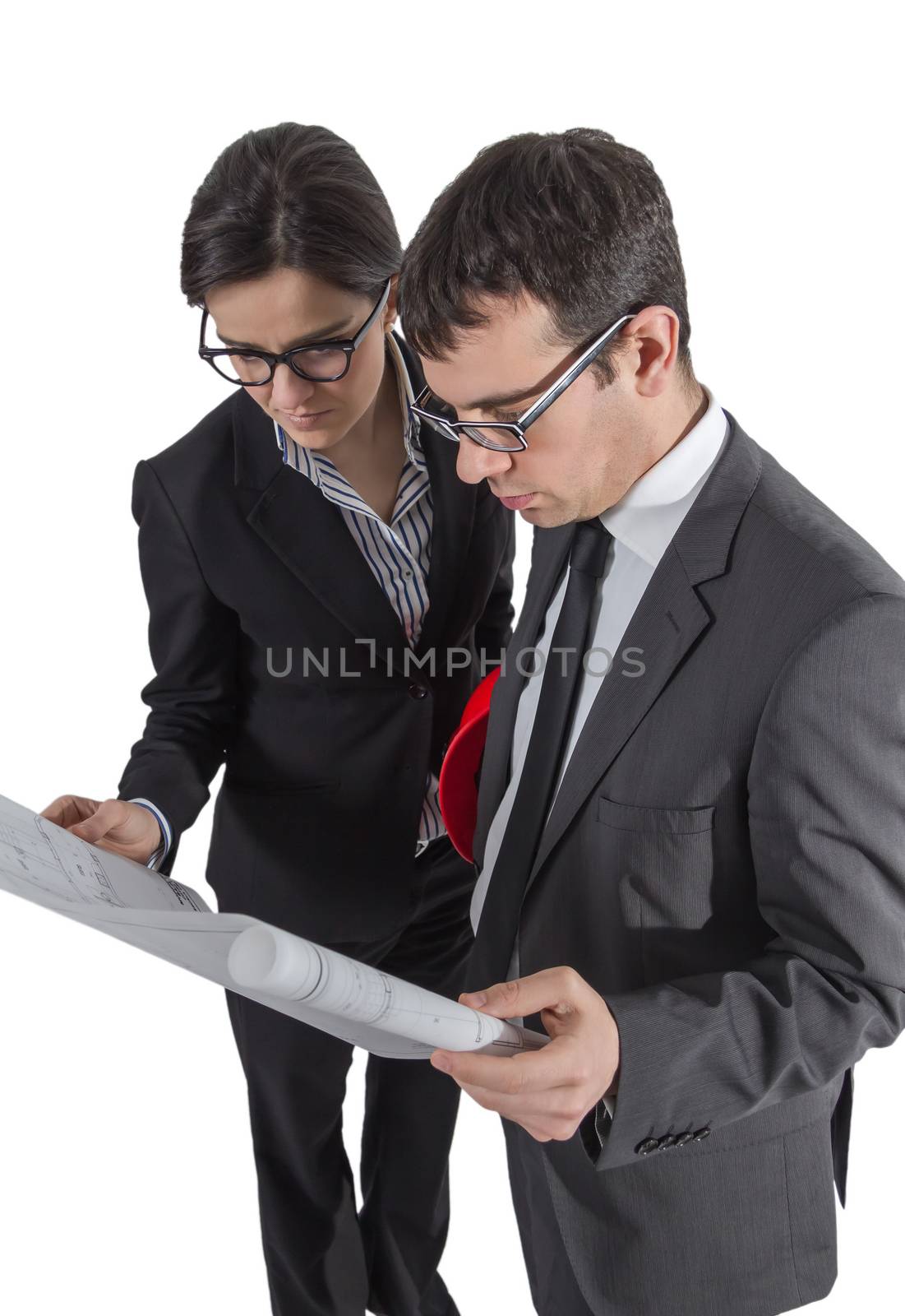 Couple of architects revising a house project plans, isolated on white background