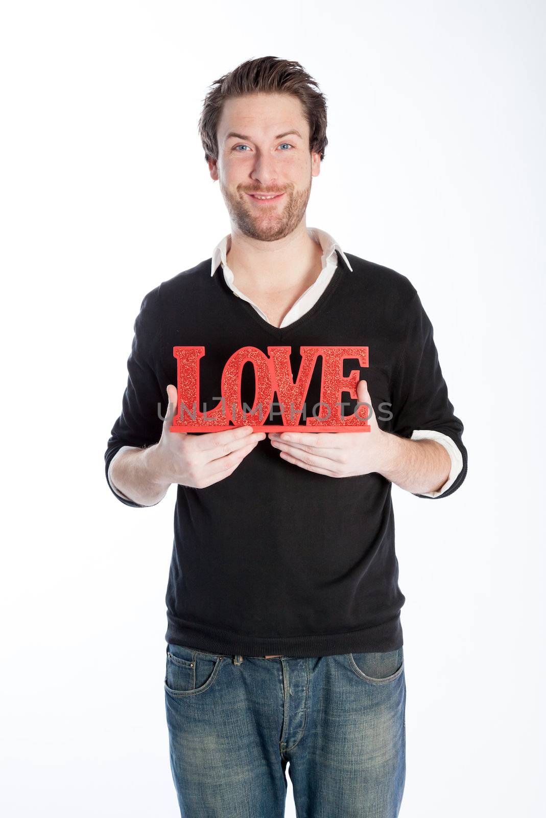 Romantic people in love shot in studio isolated on a white background