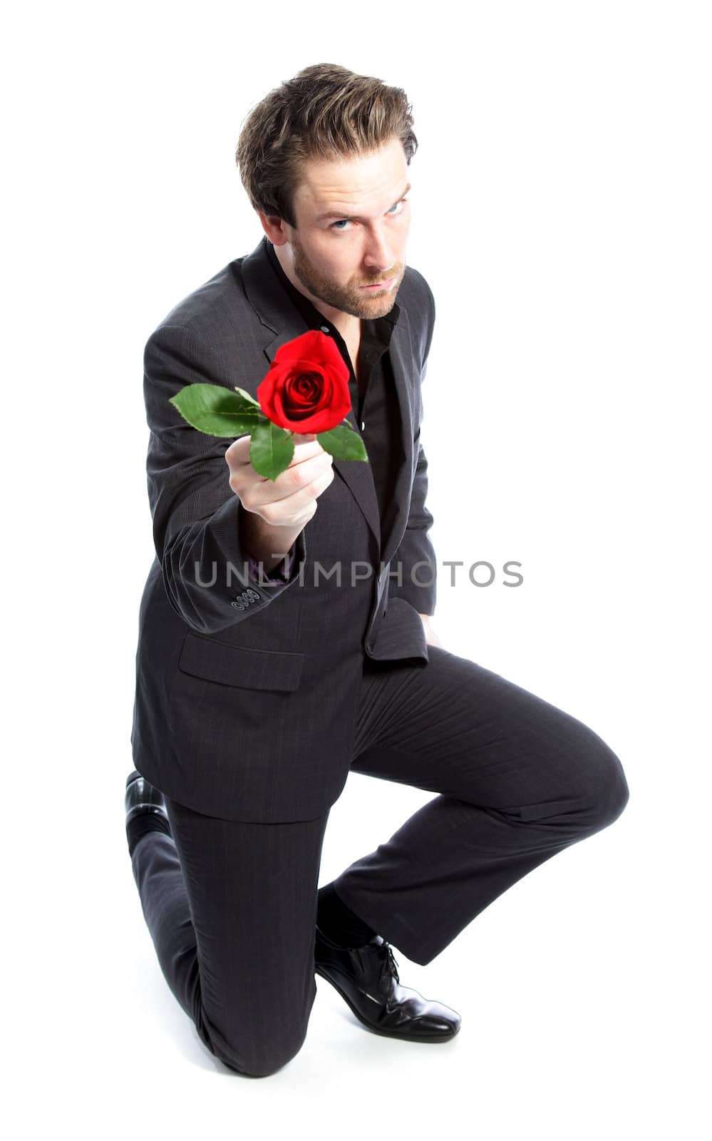 Attractive 30 years old caucasion man shot in studio isolated on a white background