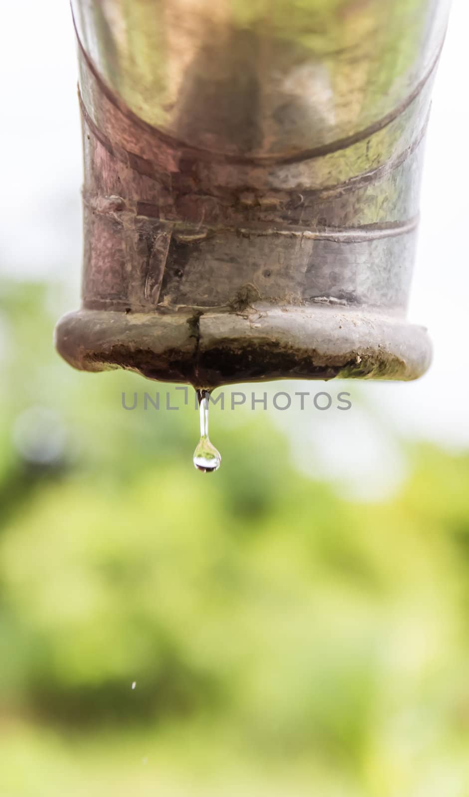 Water drips from a pipe.