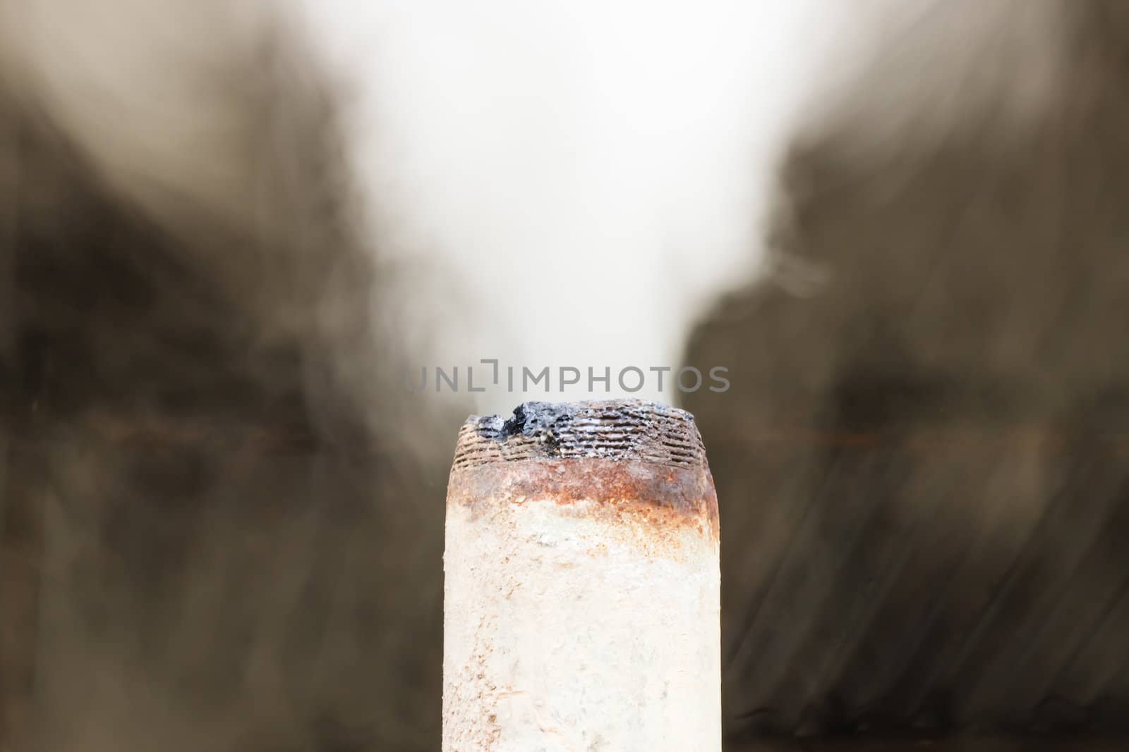 Smoke coming out of the pipe. by photo2life