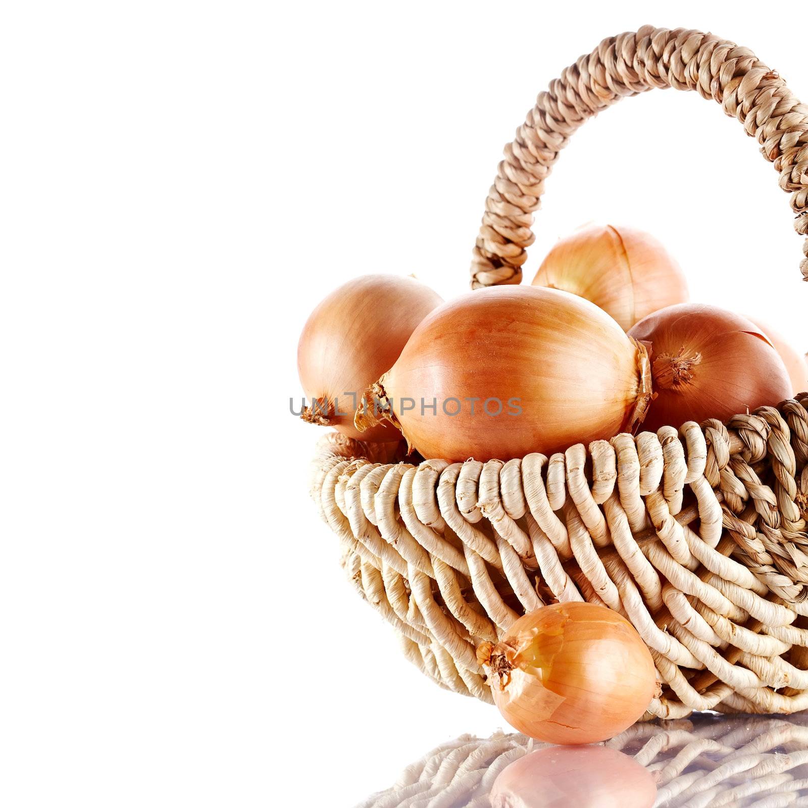 Onions napiform in a wattled basket. Onions napiform. Vegetables in a basket.