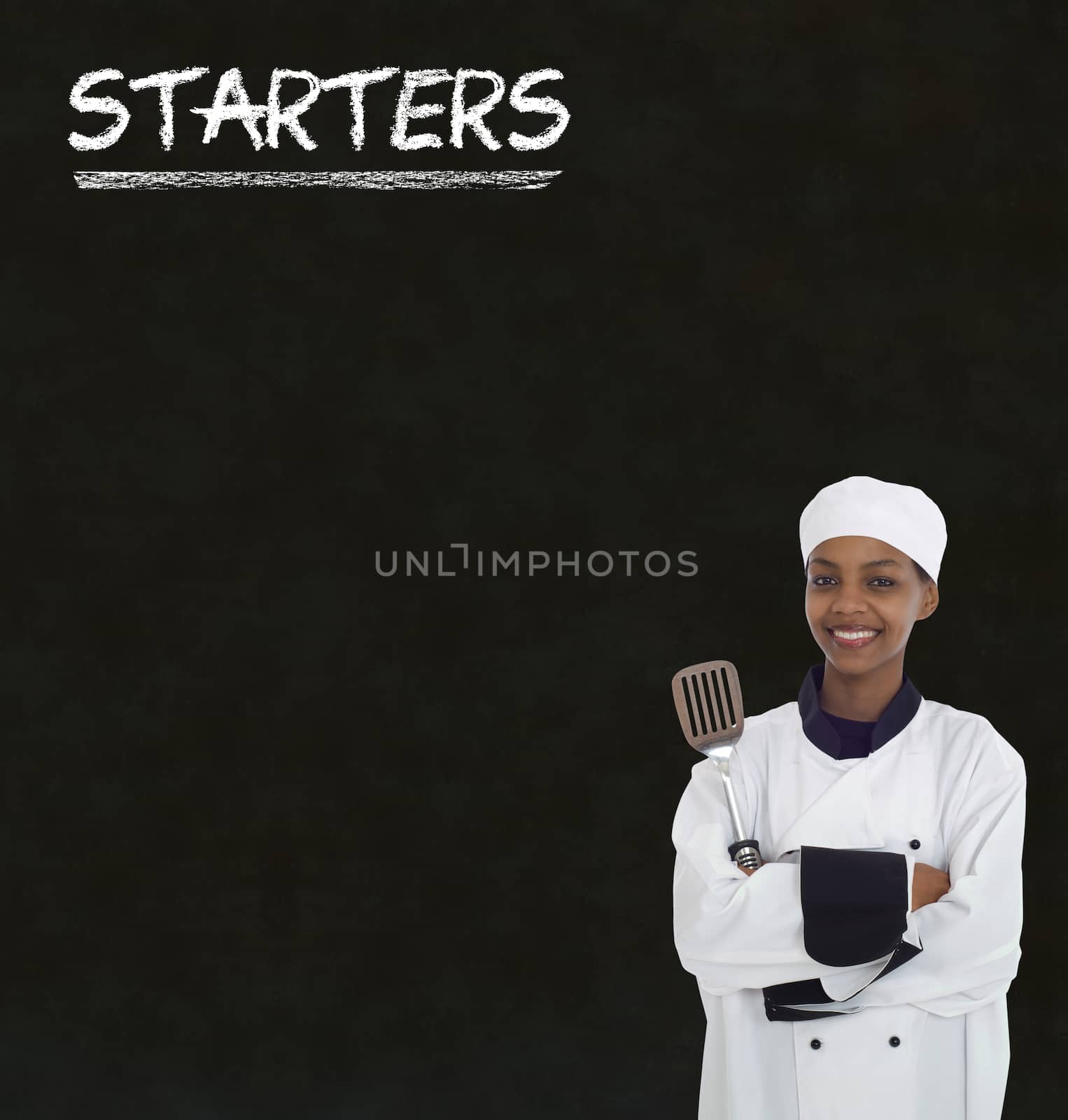 Chef with chalk starters sign written on blackboard background