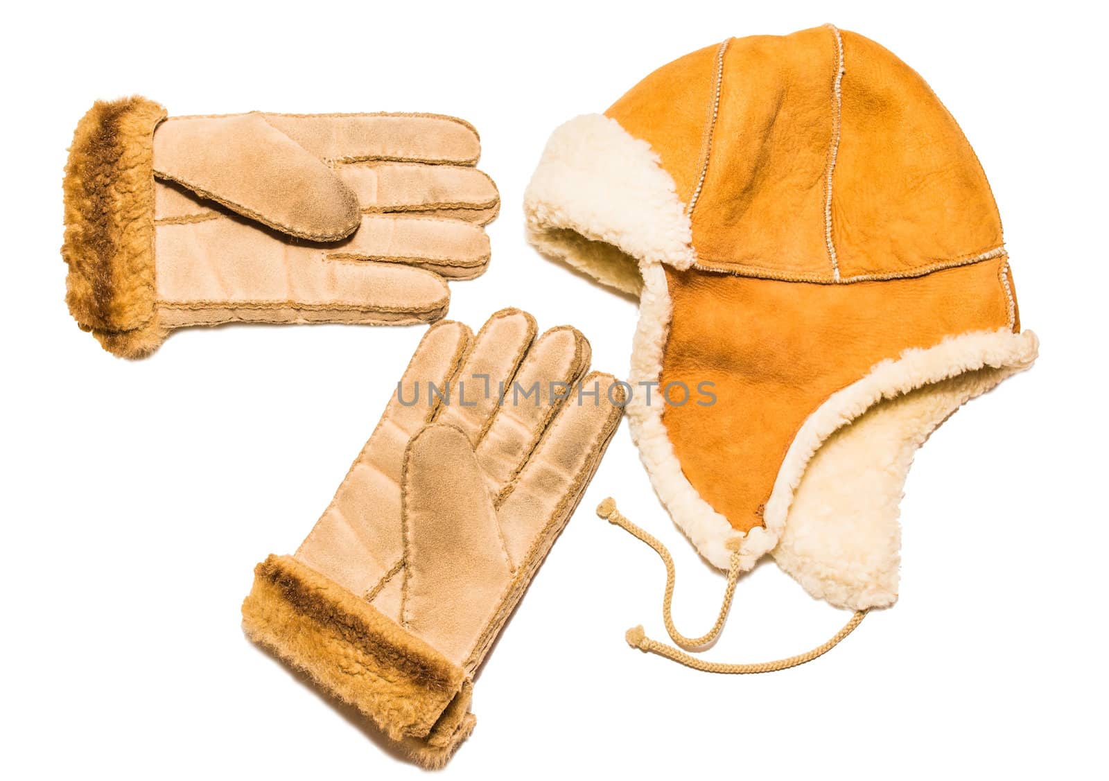 Gloves and winter cap on white background