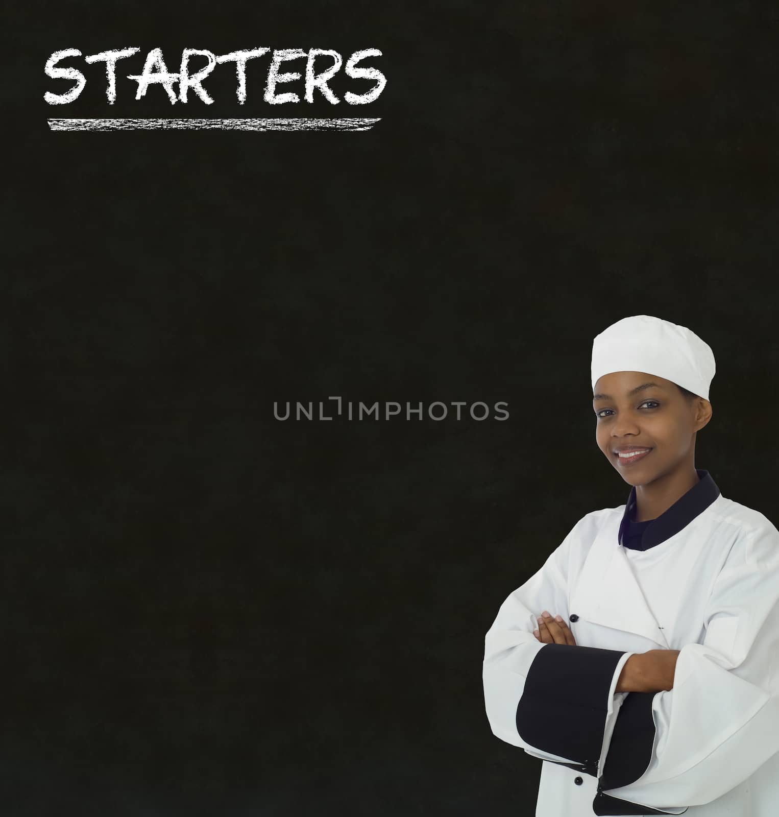 Chef with chalk starters sign on blackboard background by alistaircotton