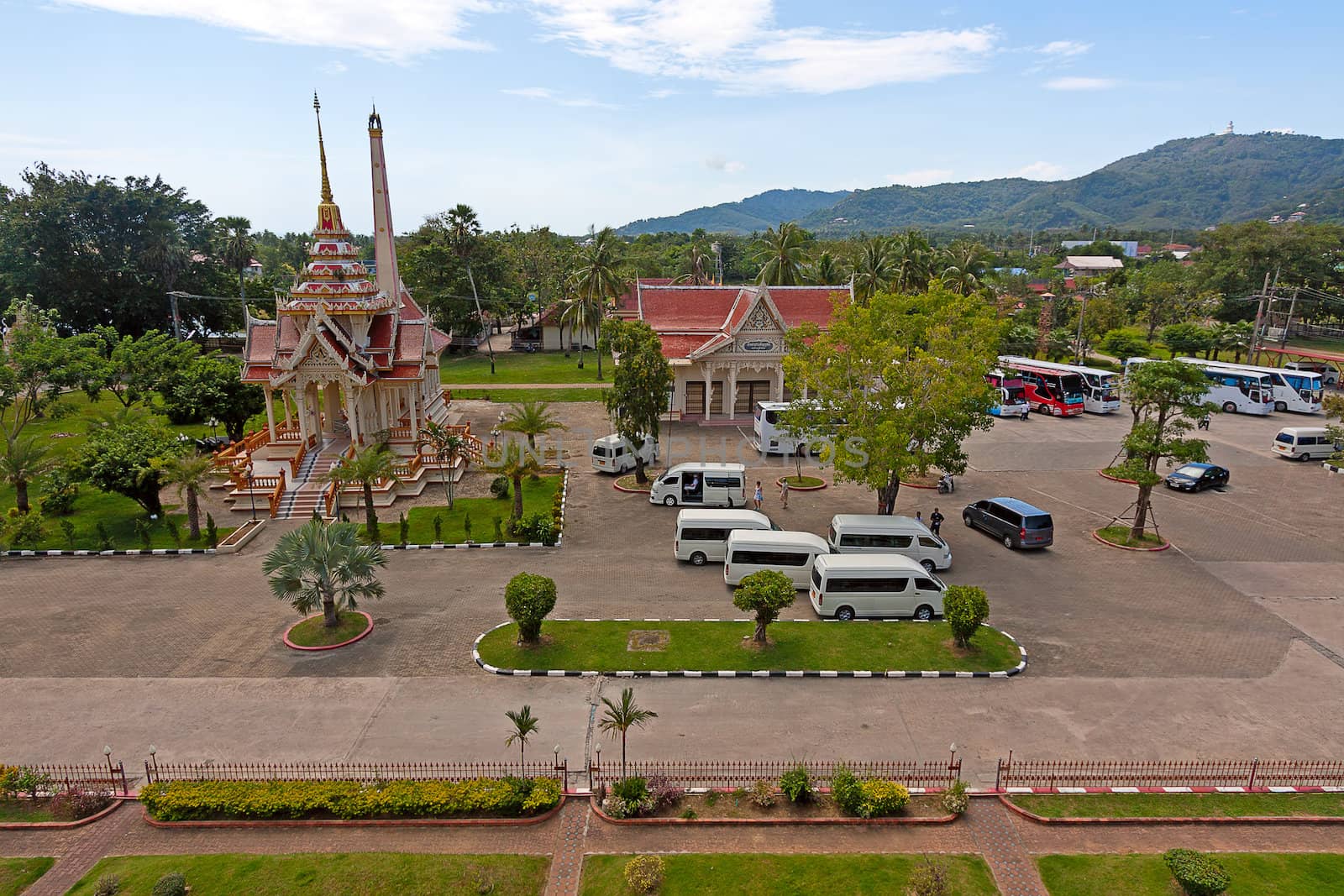 Beautiful park of  Buddhist temple on  background of blue sky, Thailand.