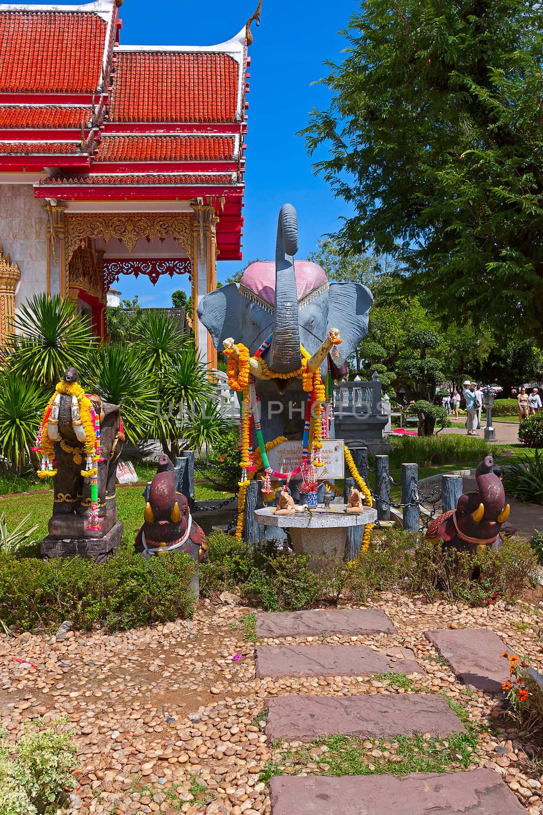 Beautiful park  on  territory of  Buddhist temple, Thailand.