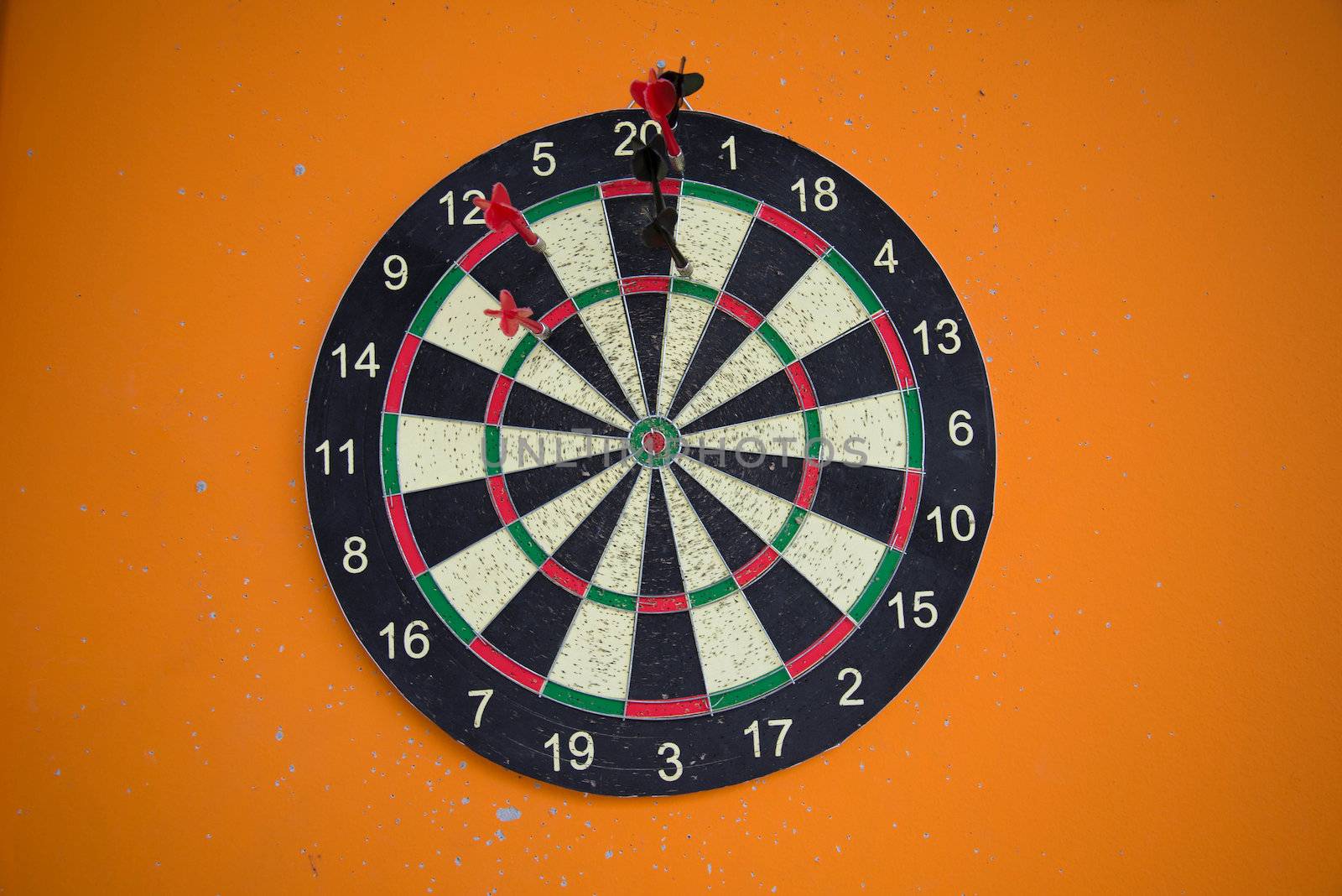 The darts on the wall in the gyms.