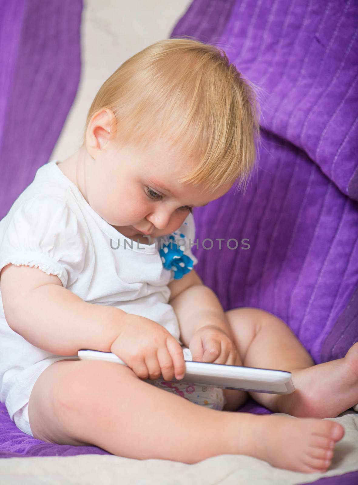 adorable baby with tablet PC