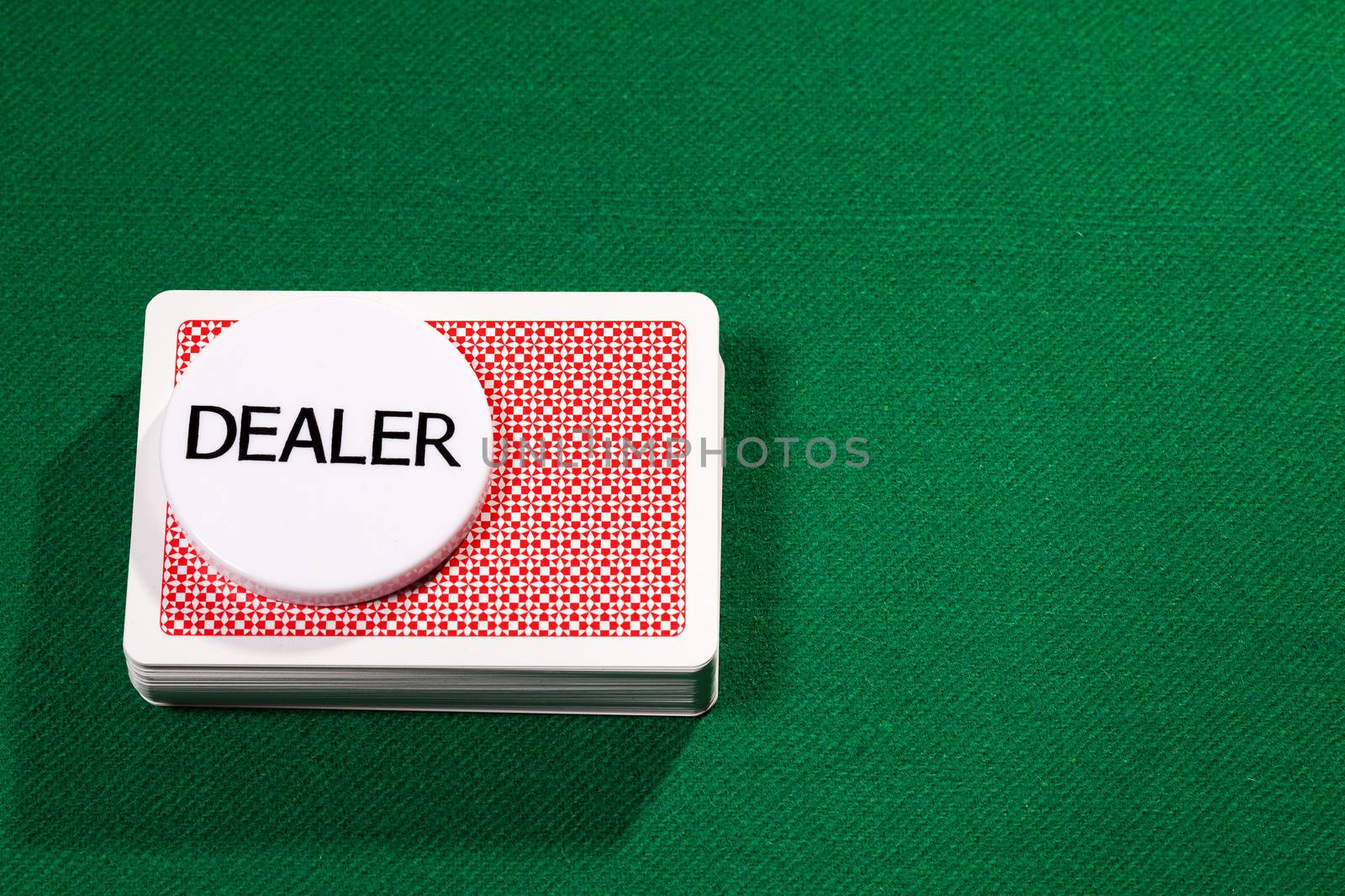 Poker cards with dealer chip by Discovod
