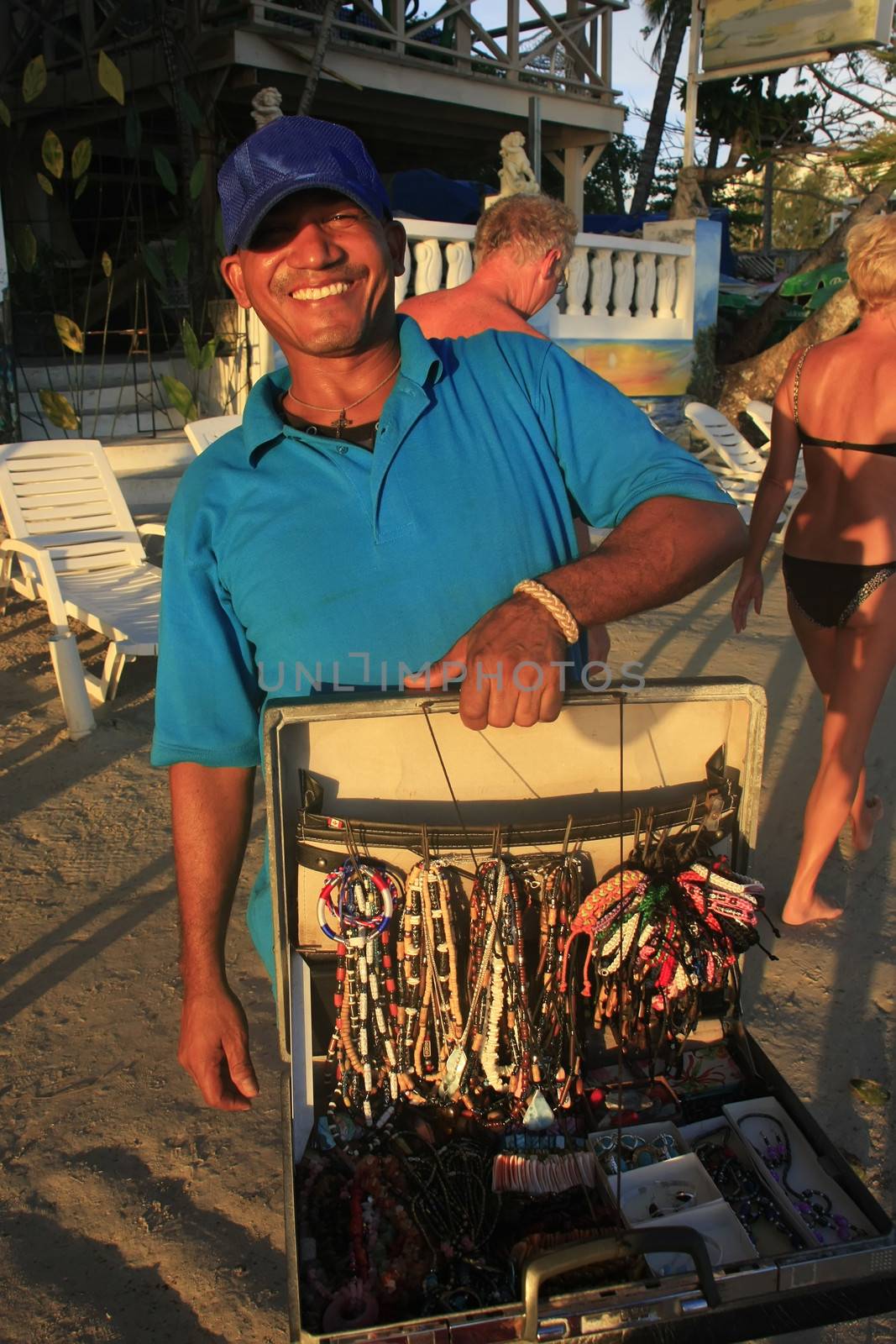 Local man selling jewelry at Boca Chica beach, Dominican Republic