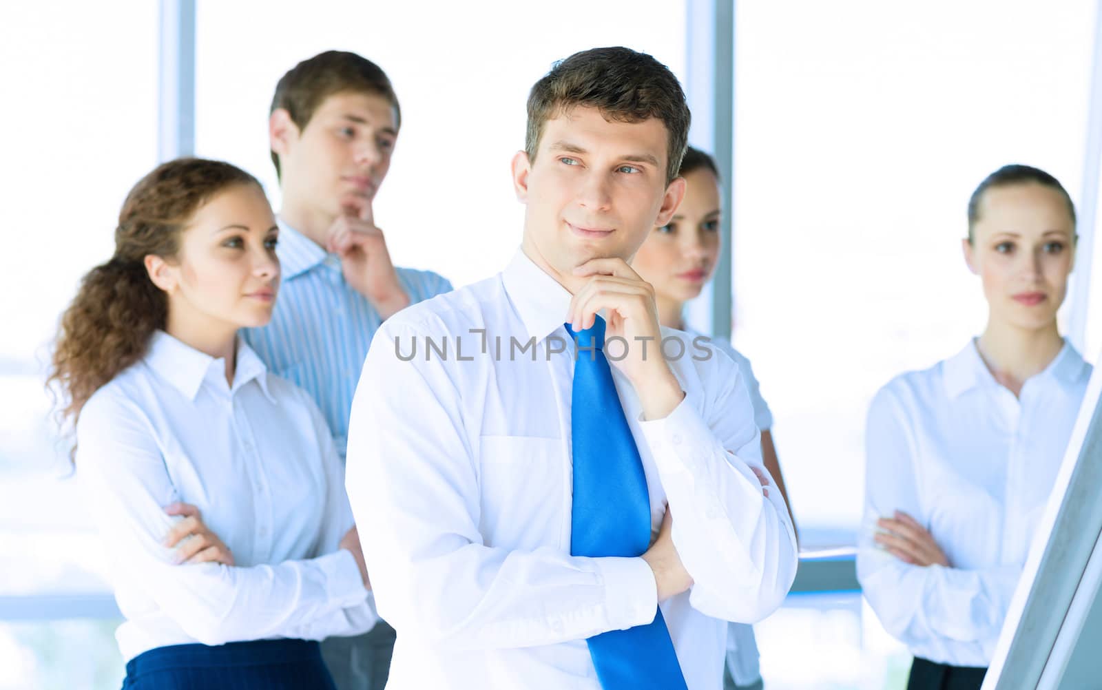 businessmen are meeting near the flipchart by adam121