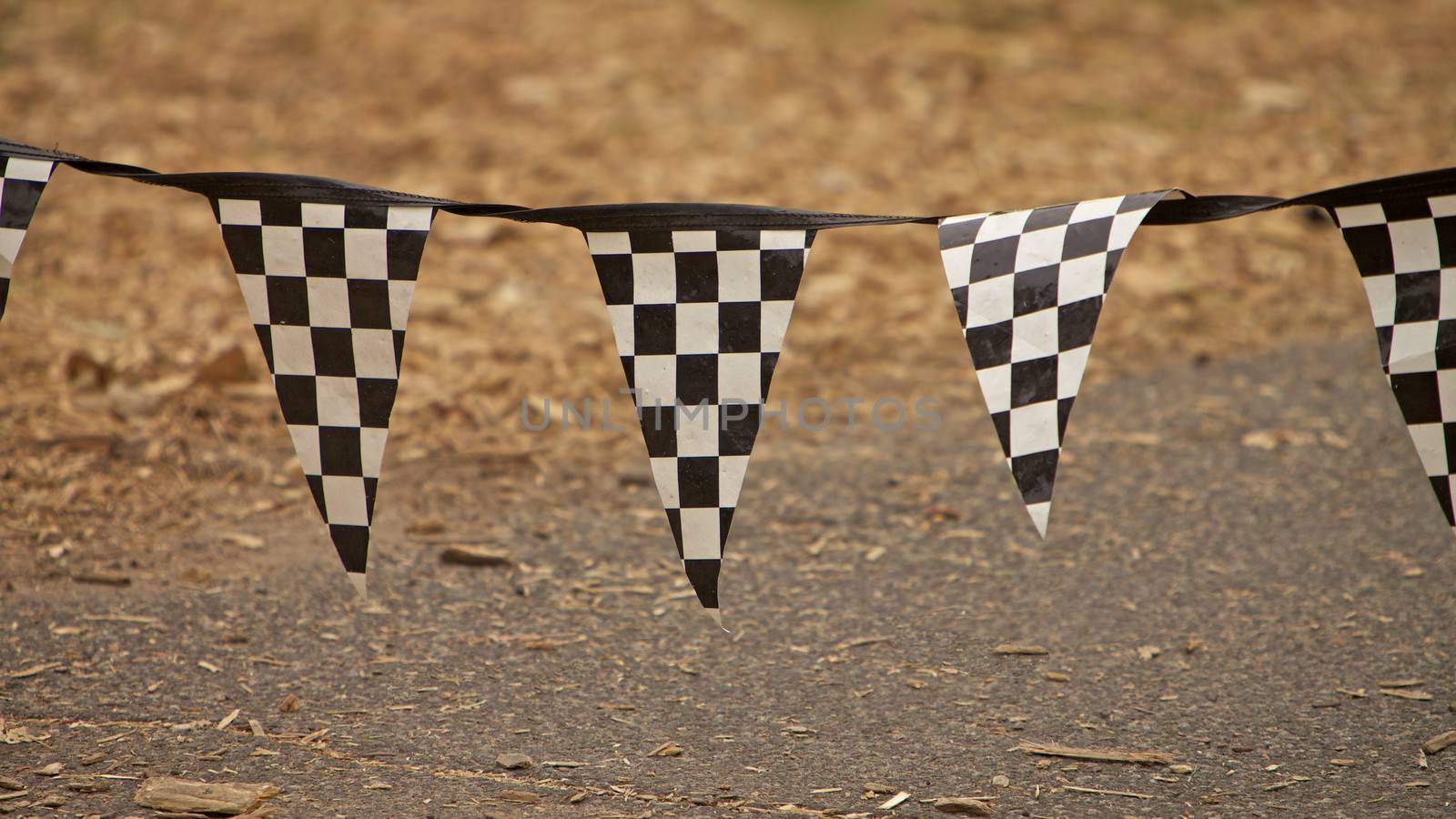 Racing flags in a race and fast cars