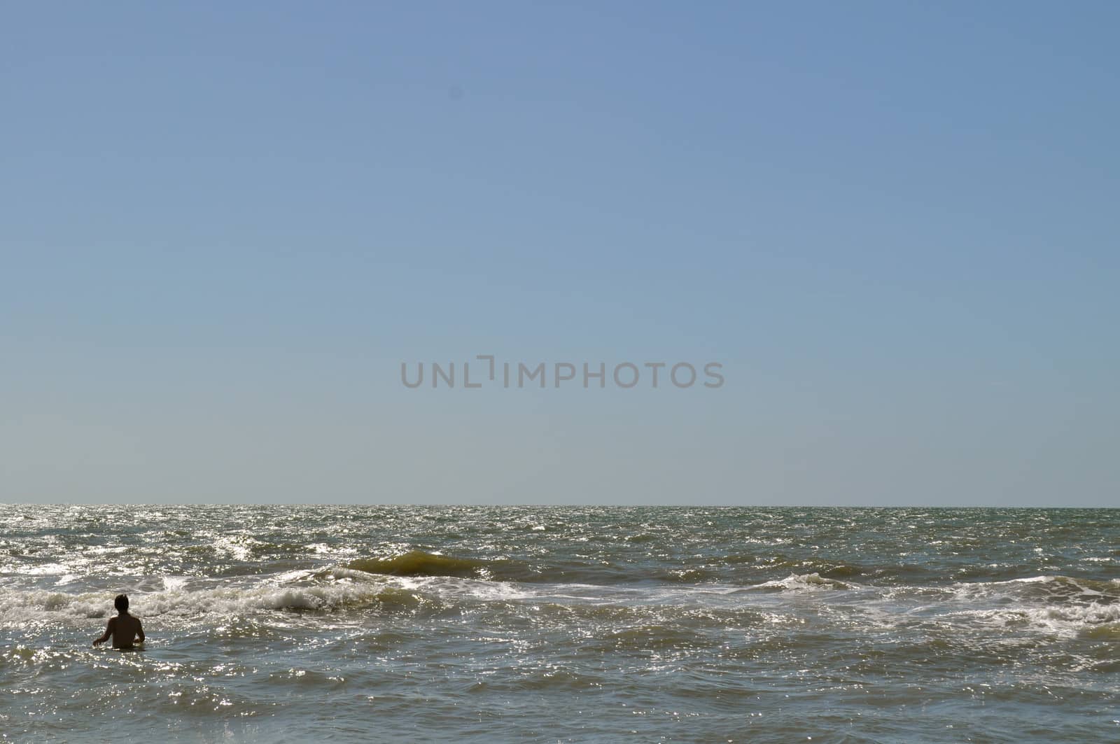 Person in waves 2 by RefocusPhoto
