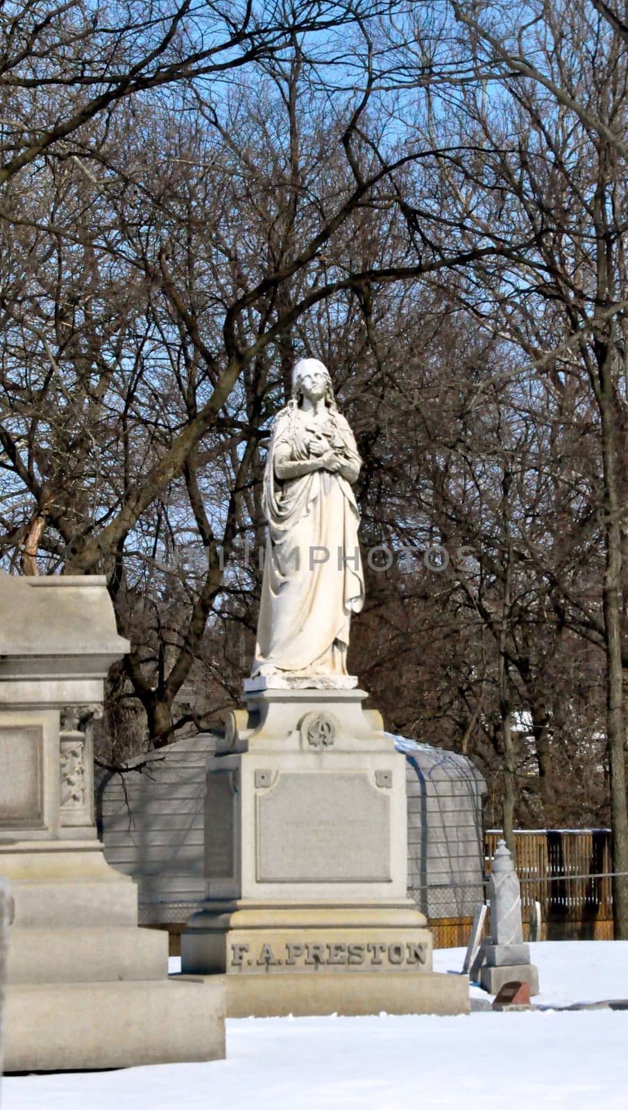 Marble Statues in a Cemetery