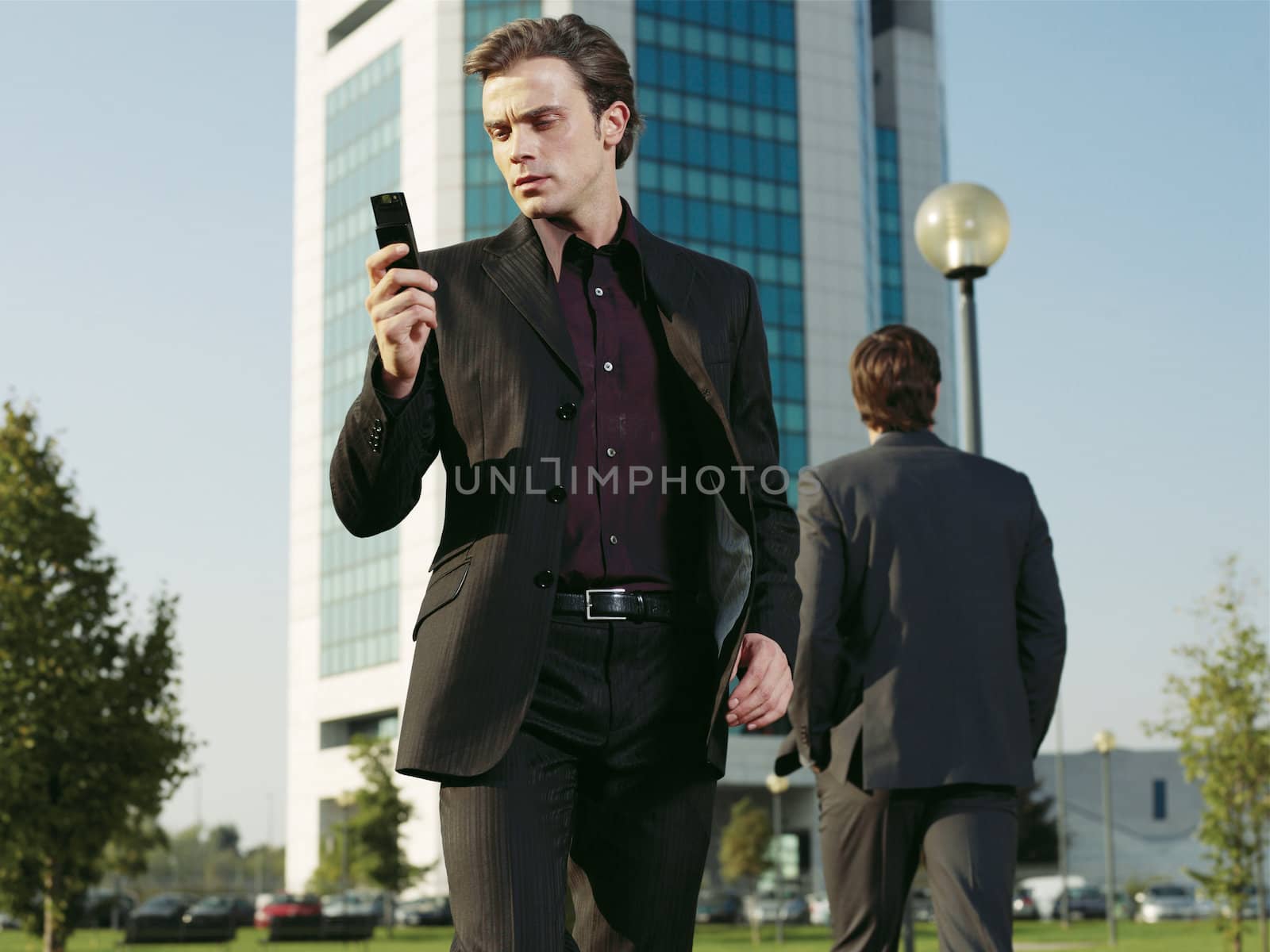 Businessman working near office aa by toocan