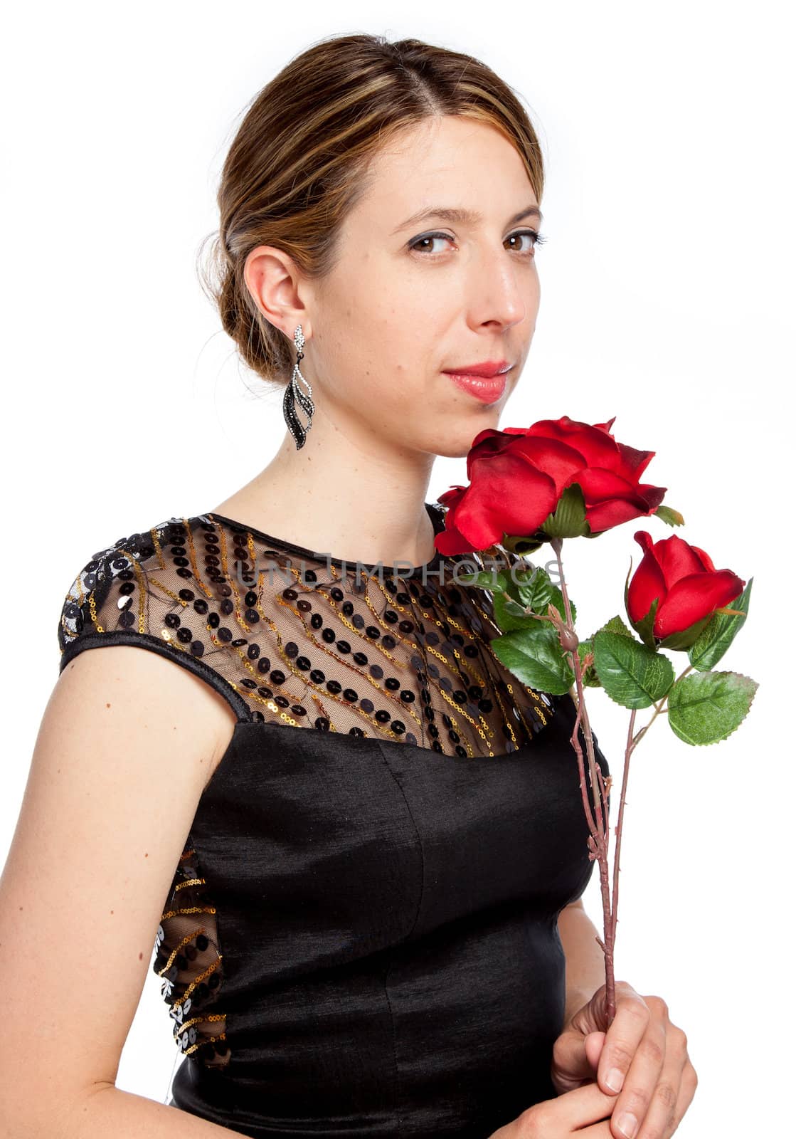 Attractive caucasion girl wearing an evening gown in her 30s shot in studio isolated on a white background