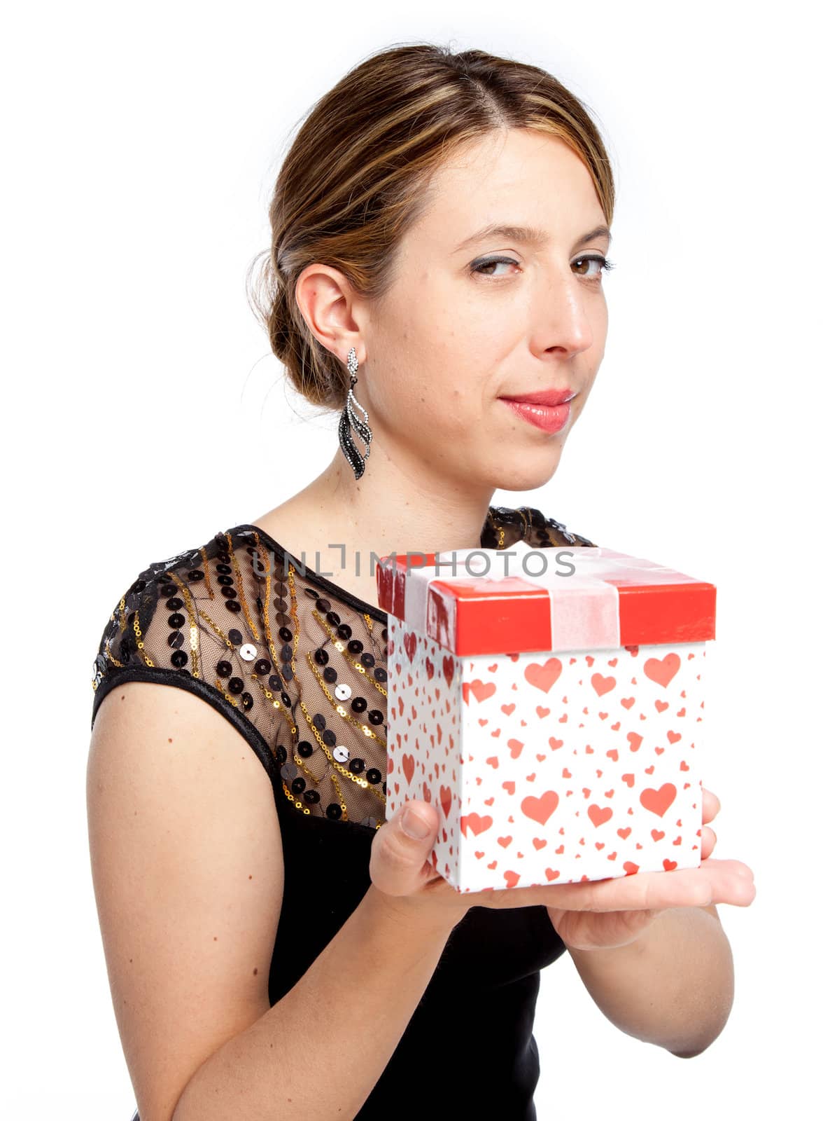 Attractive caucasion girl wearing an evening gown in her 30s shot in studio isolated on a white background