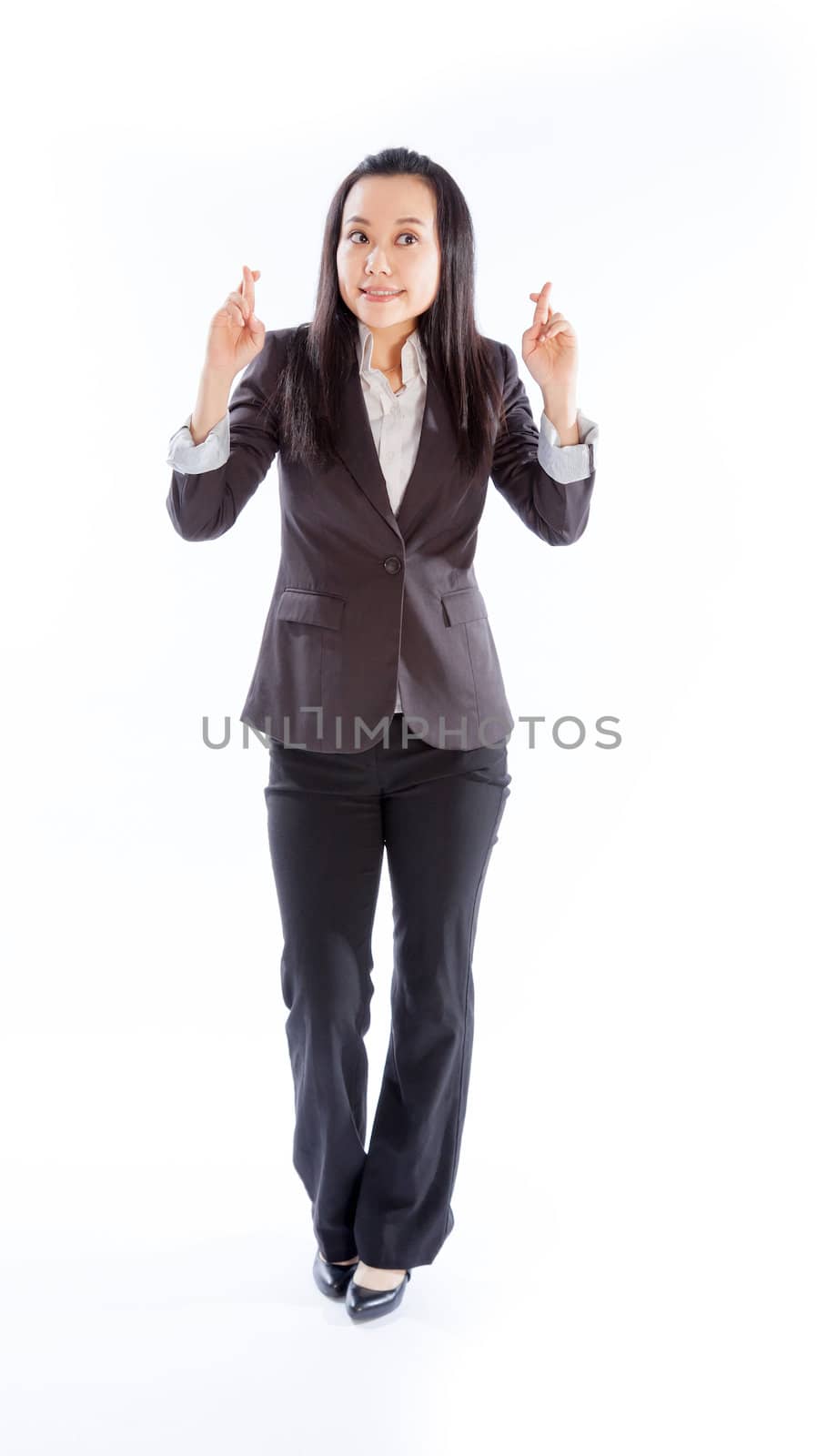 Attractive asian girl in her 30s shot in studio isolated on a white background