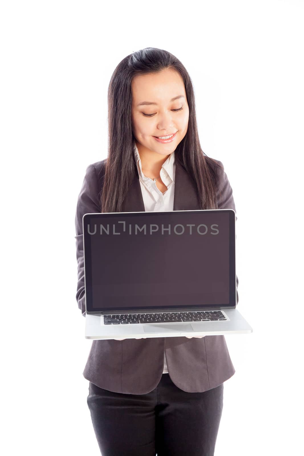 Attractive asian girl in her 30s shot in studio isolated on a white background