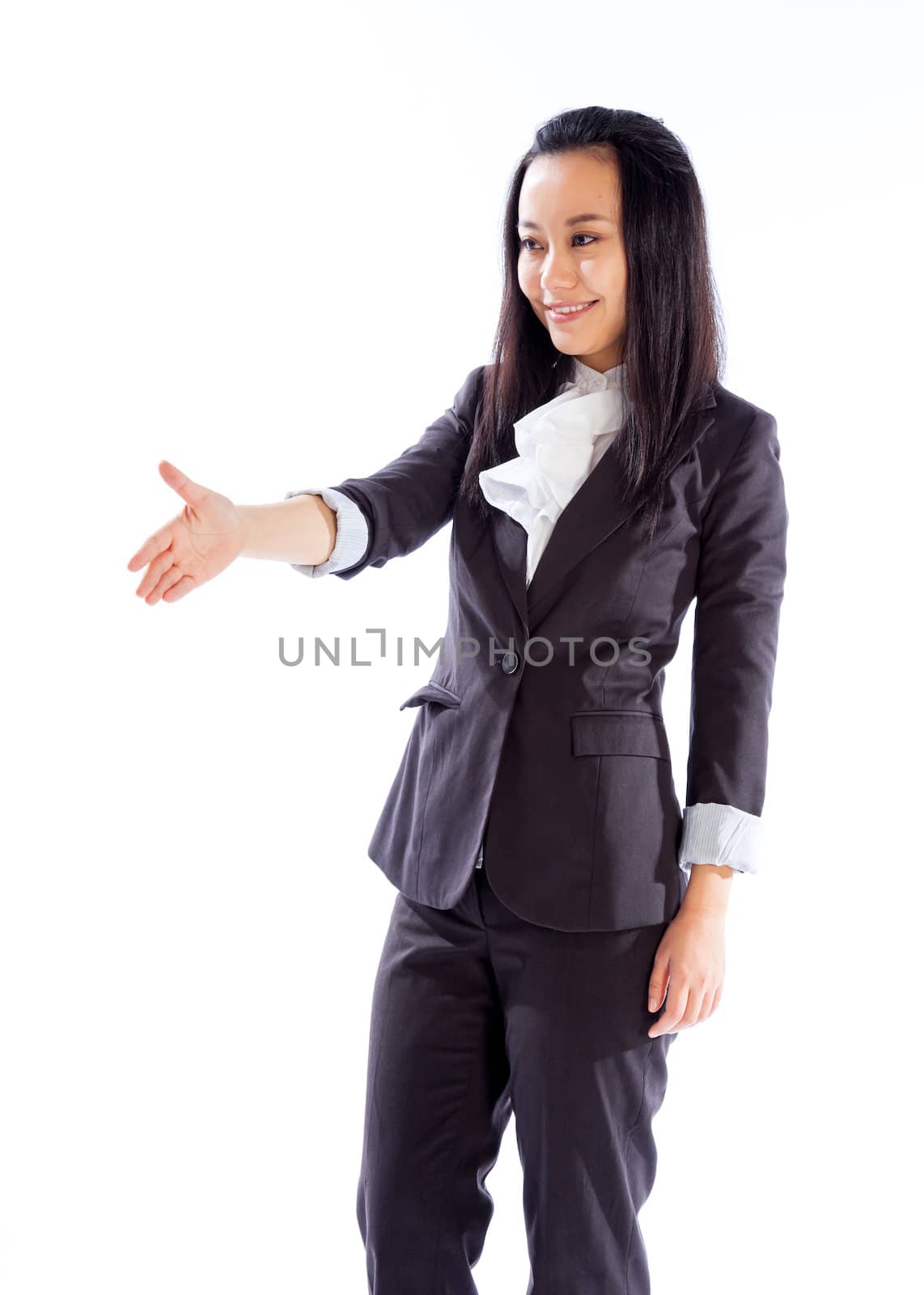 Attractive asian girl in her 30s shot in studio isolated on a white background