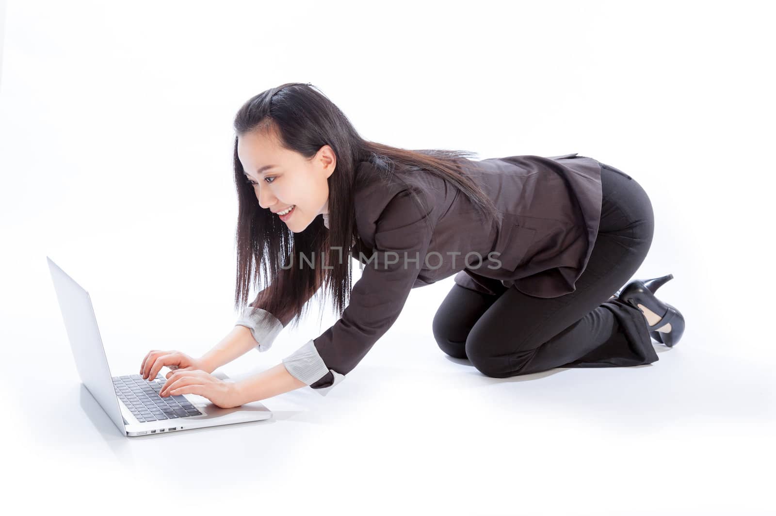 Attractive asian girl in her 30s shot in studio isolated on a white background