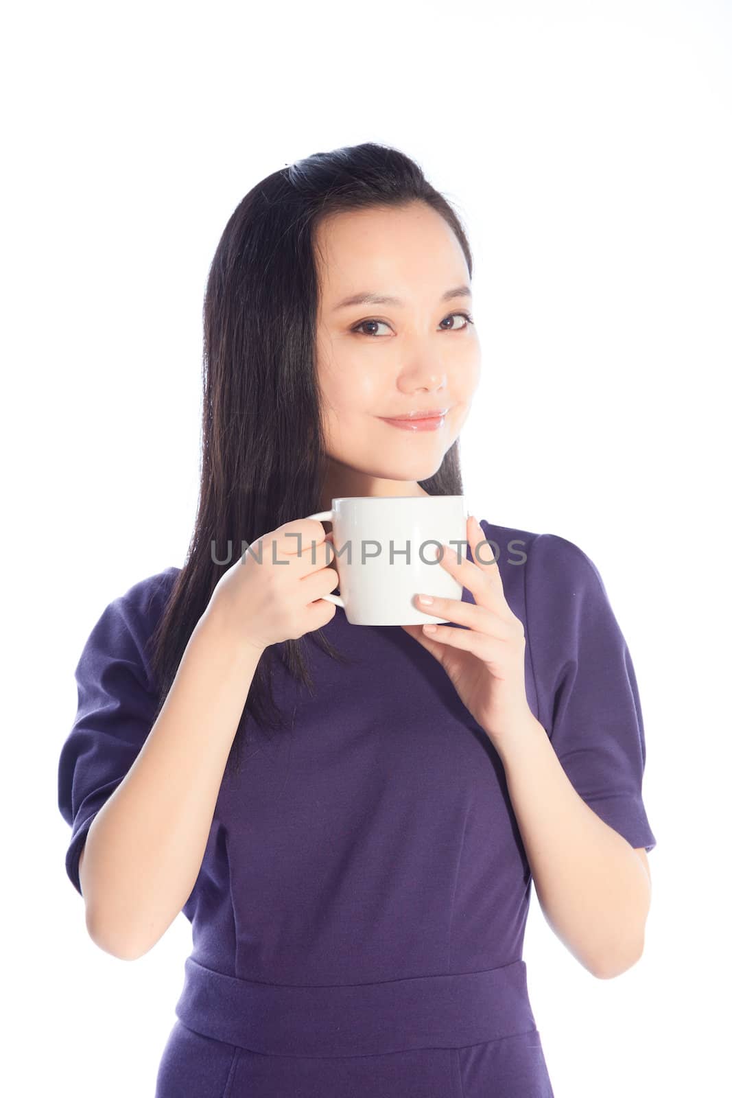 Attractive asian girl in her 30s shot in studio isolated on a white background