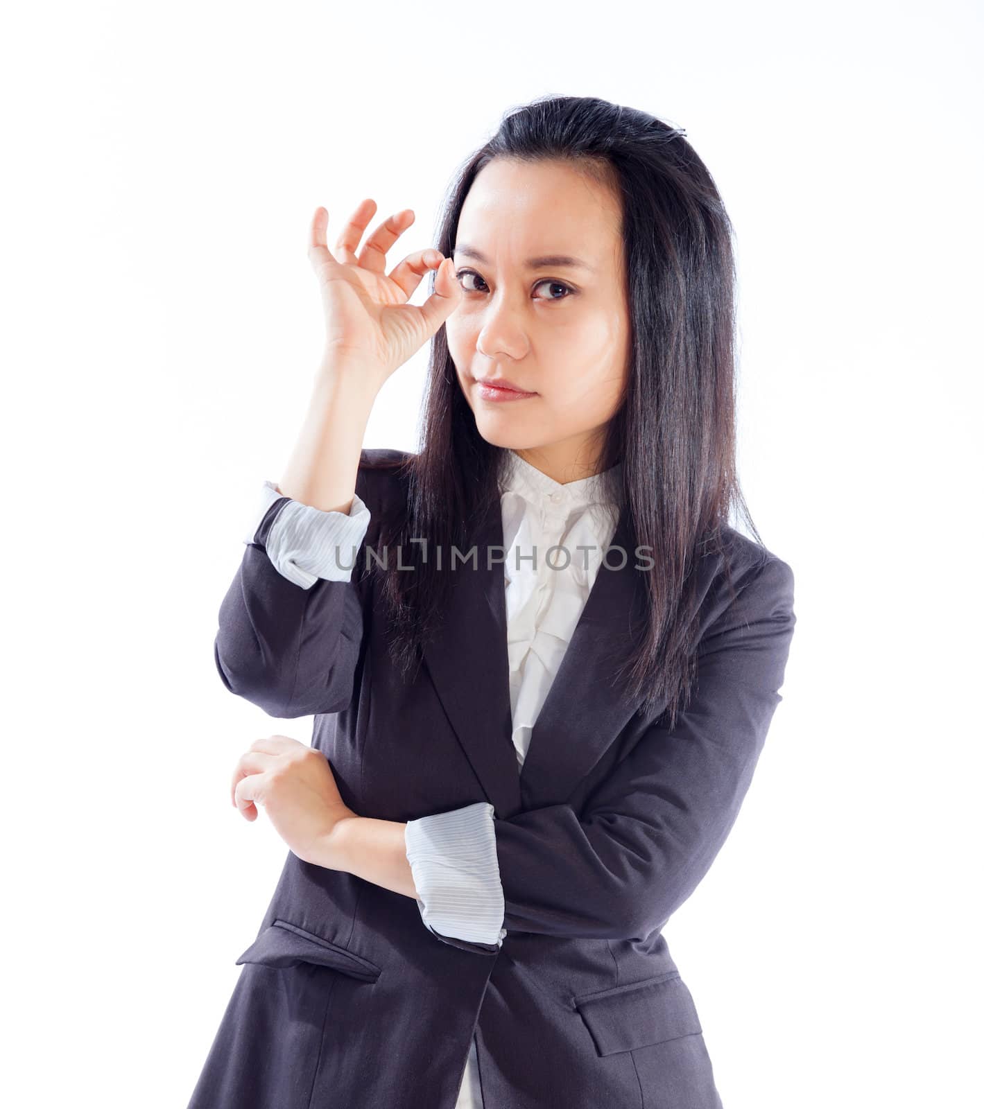 Attractive asian girl in her 30s shot in studio isolated on a white background