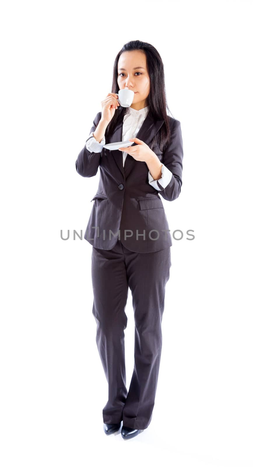 Attractive asian girl in her 30s shot in studio isolated on a white background