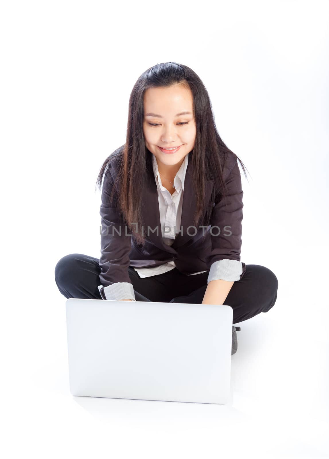 Attractive asian girl in her 30s shot in studio isolated on a white background