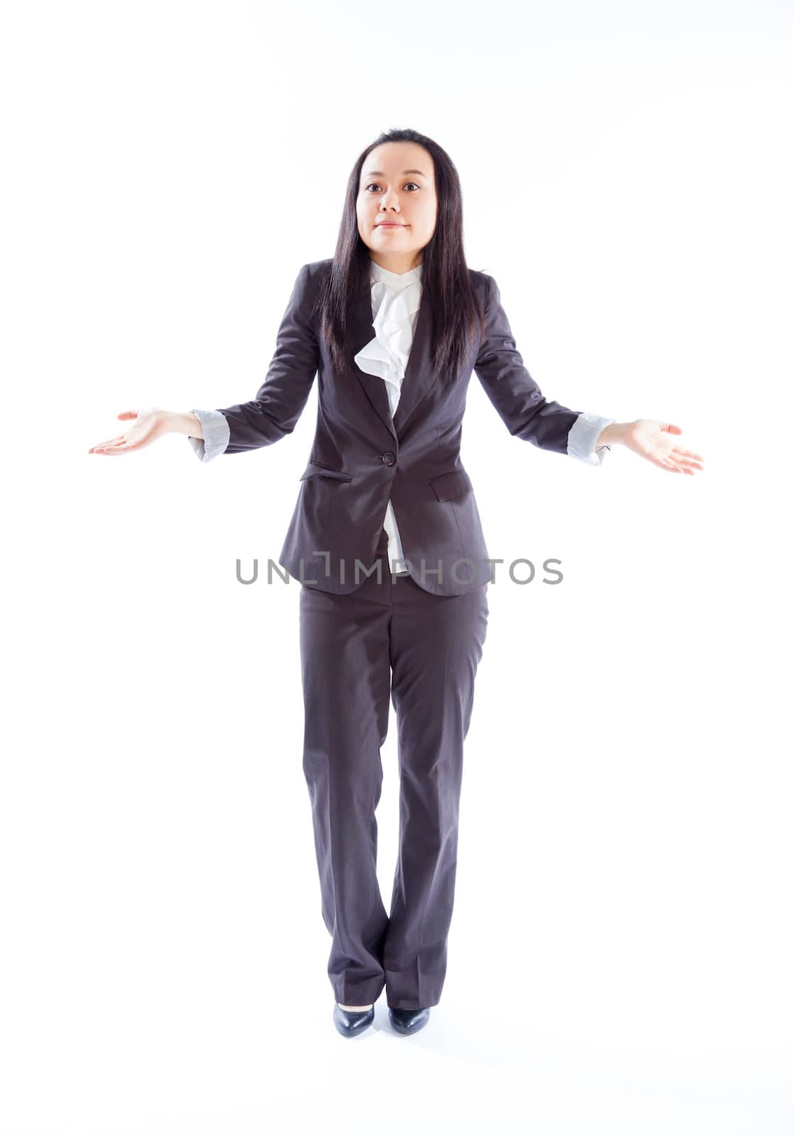 Attractive asian girl in her 30s shot in studio isolated on a white background