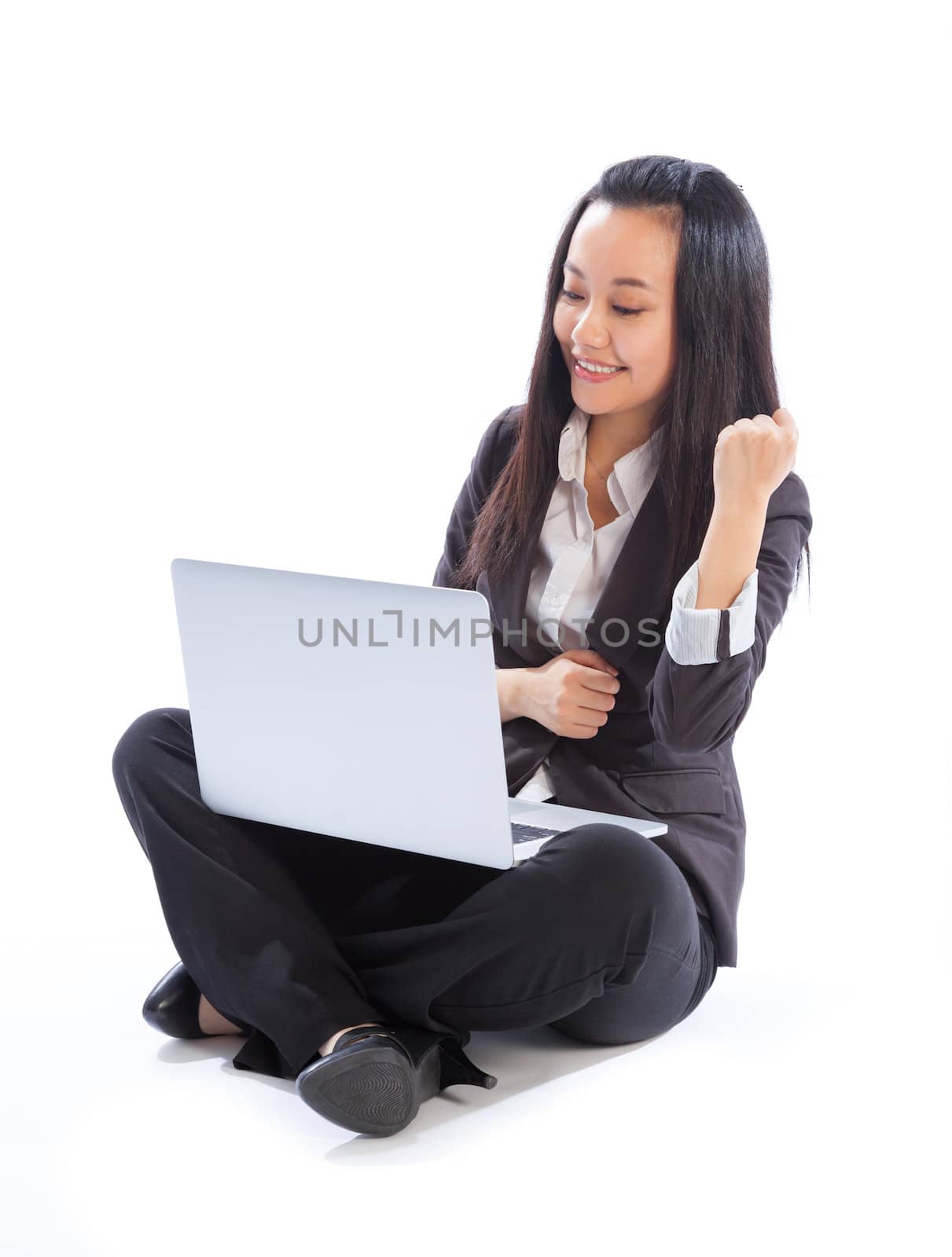 Attractive asian girl in her 30s shot in studio isolated on a white background