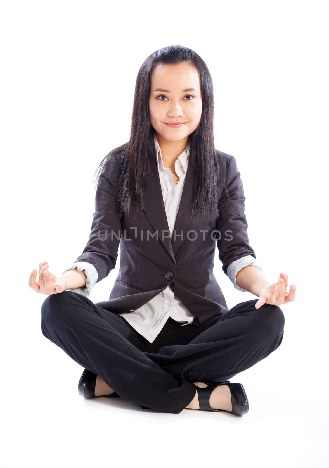 Attractive asian girl in her 30s shot in studio isolated on a white background