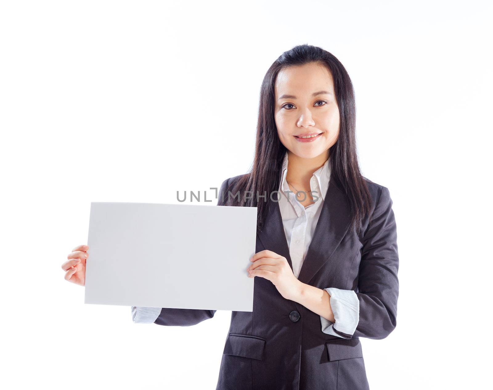 Attractive asian girl in her 30s shot in studio isolated on a white background