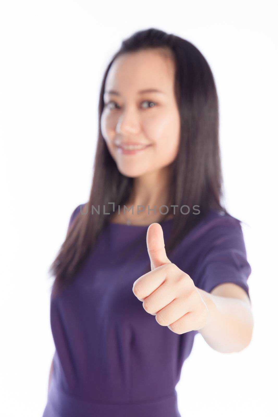 Attractive asian girl in her 30s shot in studio isolated on a white background