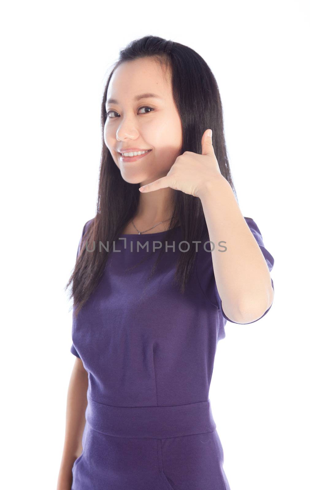 Attractive asian girl in her 30s shot in studio isolated on a white background