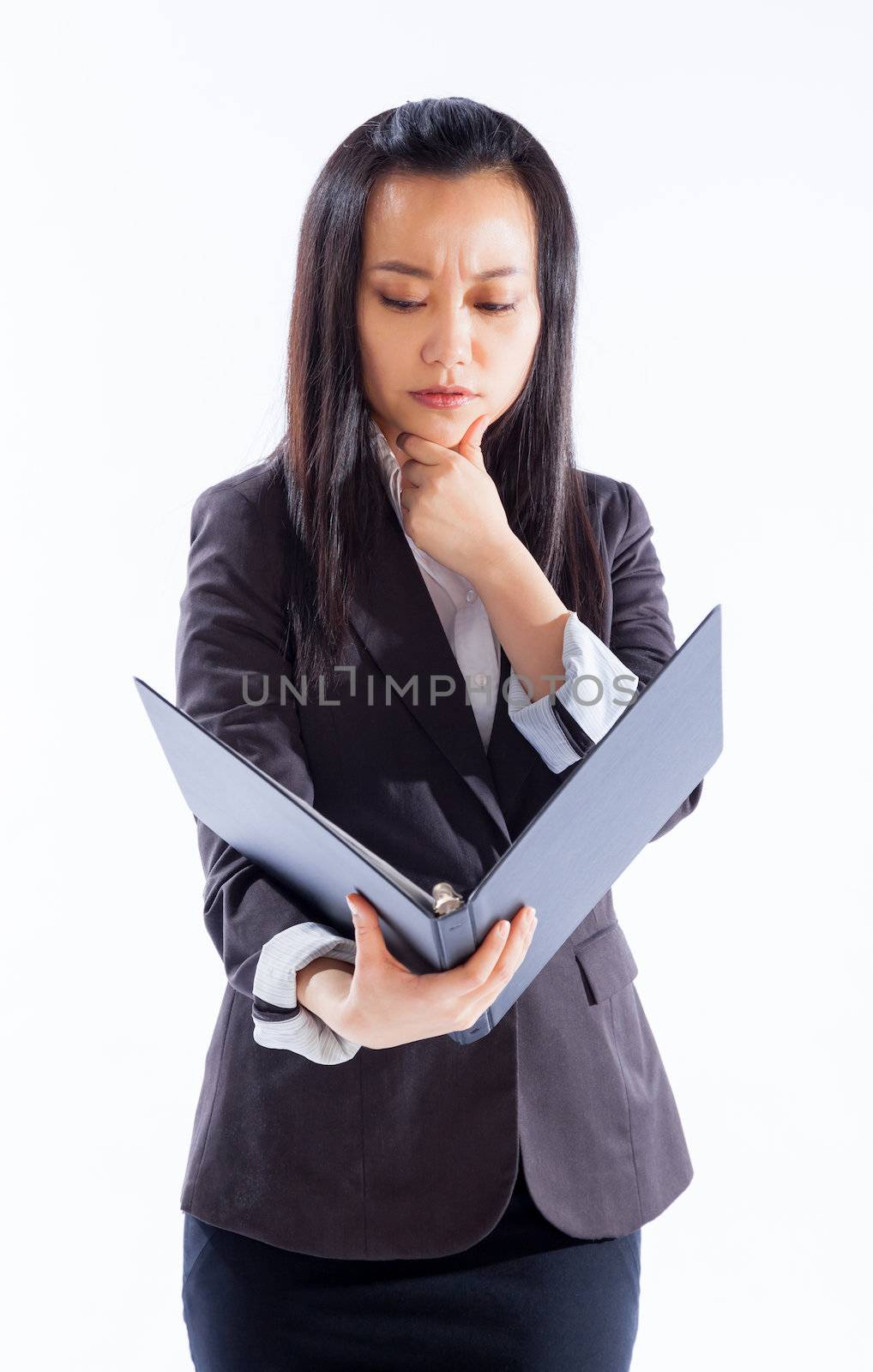 Attractive asian girl in her 30s shot in studio isolated on a white background