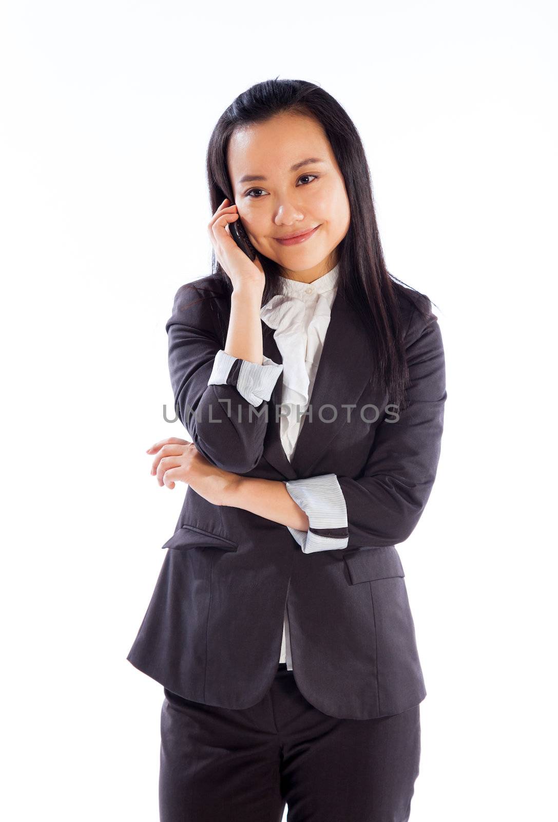 Attractive asian girl in her 30s shot in studio isolated on a white background