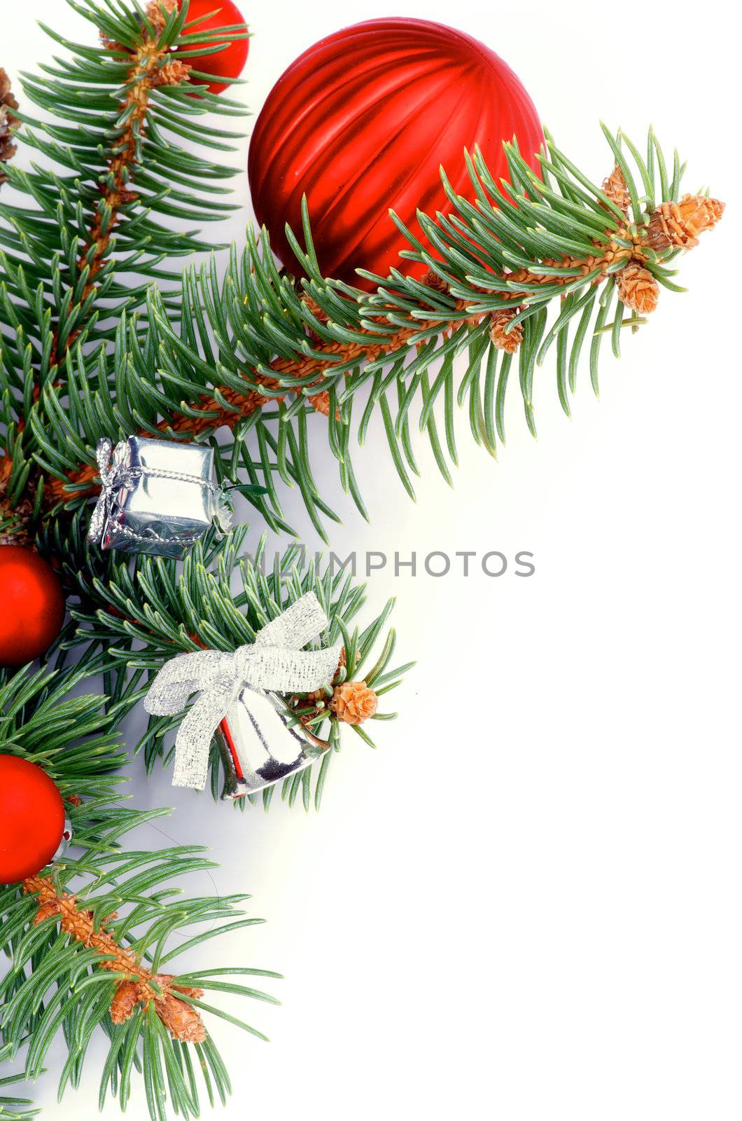 Christmas Decoration with Spruce Branch, Red Bauble, Silver Gift Boxes and Bow isolated on white background