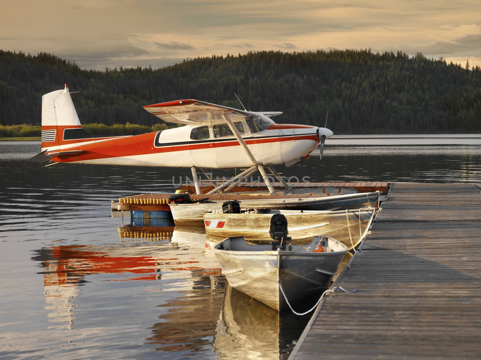 Floatplane moored at a jetty on Canim Lake in British Columbia, western Canada