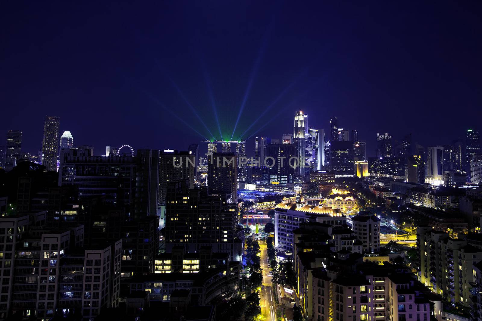View of Singapore cityscape at night, with lightshow