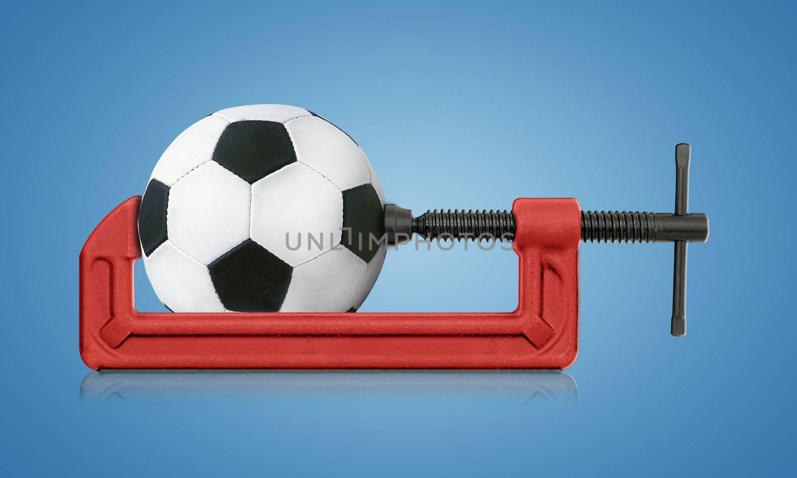 horizontal hand vise c-clamp and football, sport conceptual image
