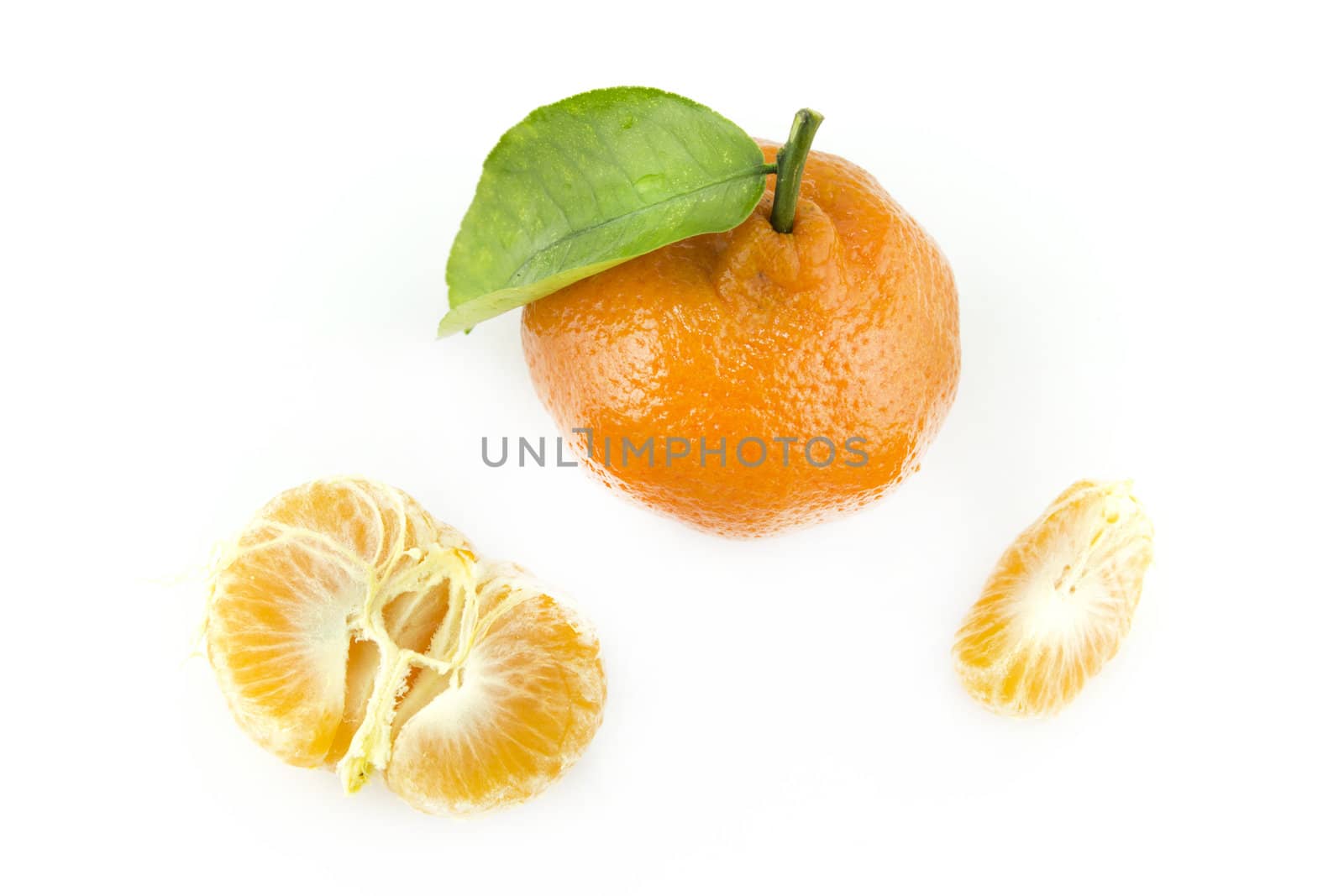 Fresh tangerine with leaves isolated on a white background