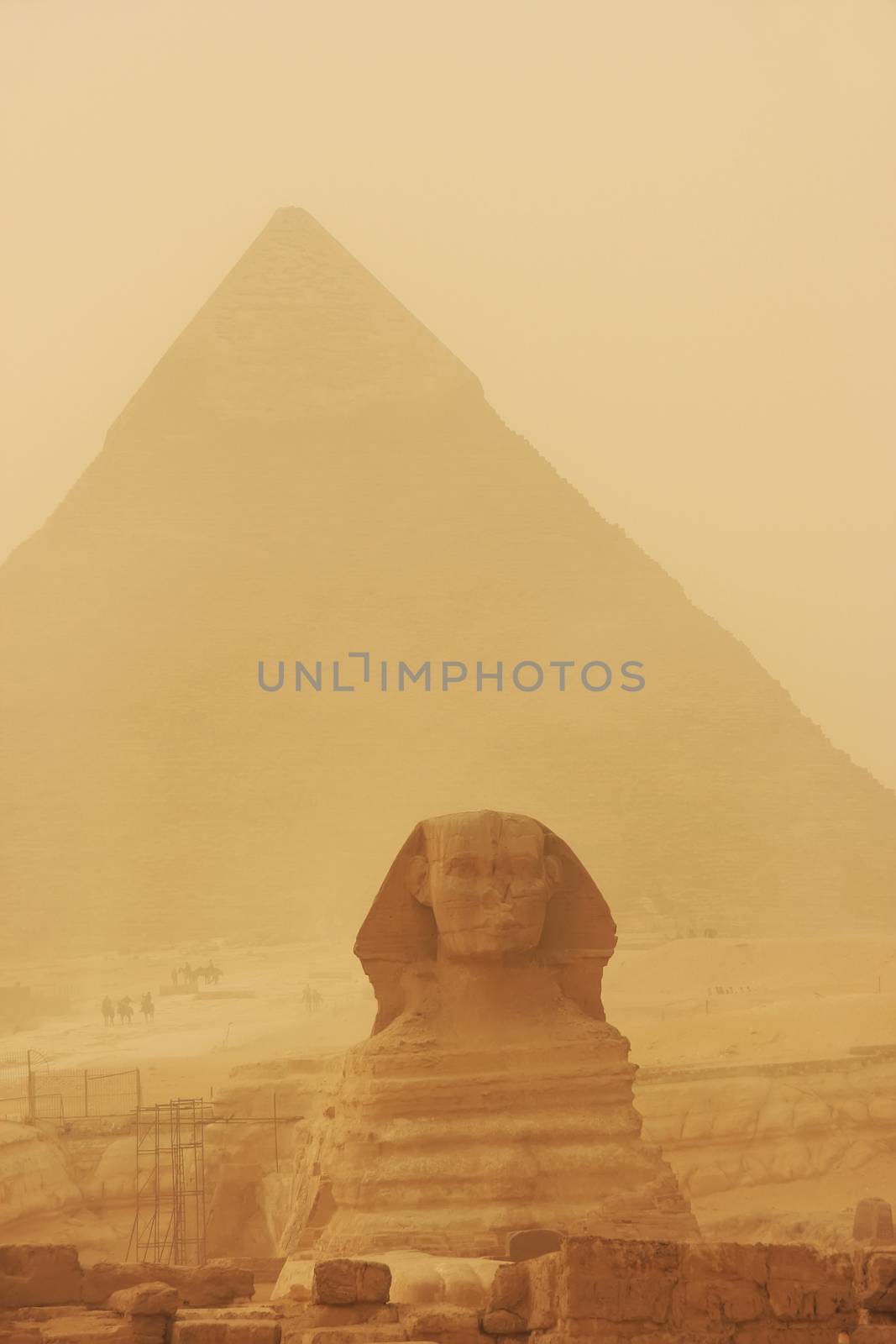 The Sphinx and Pyramid of Khafre in a sand storm, Cairo by donya_nedomam