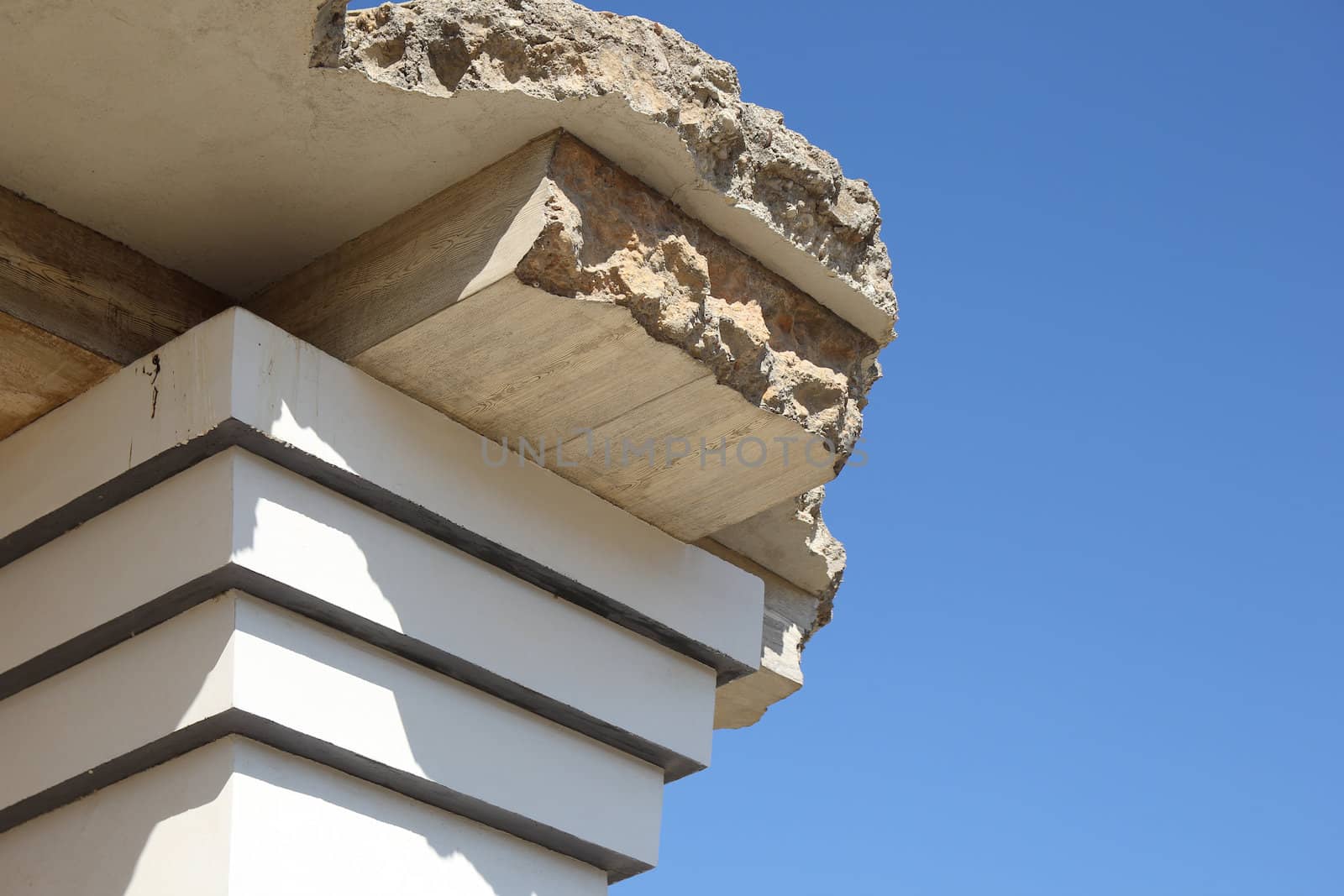 columns of an ancient palace on a background of blue sky























