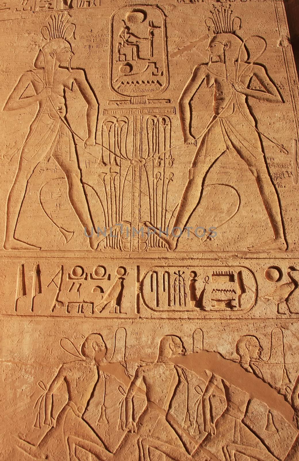 Ancient hieroglyphics on the wall of Great temple of Abu Simbel, Nubia, Egypt